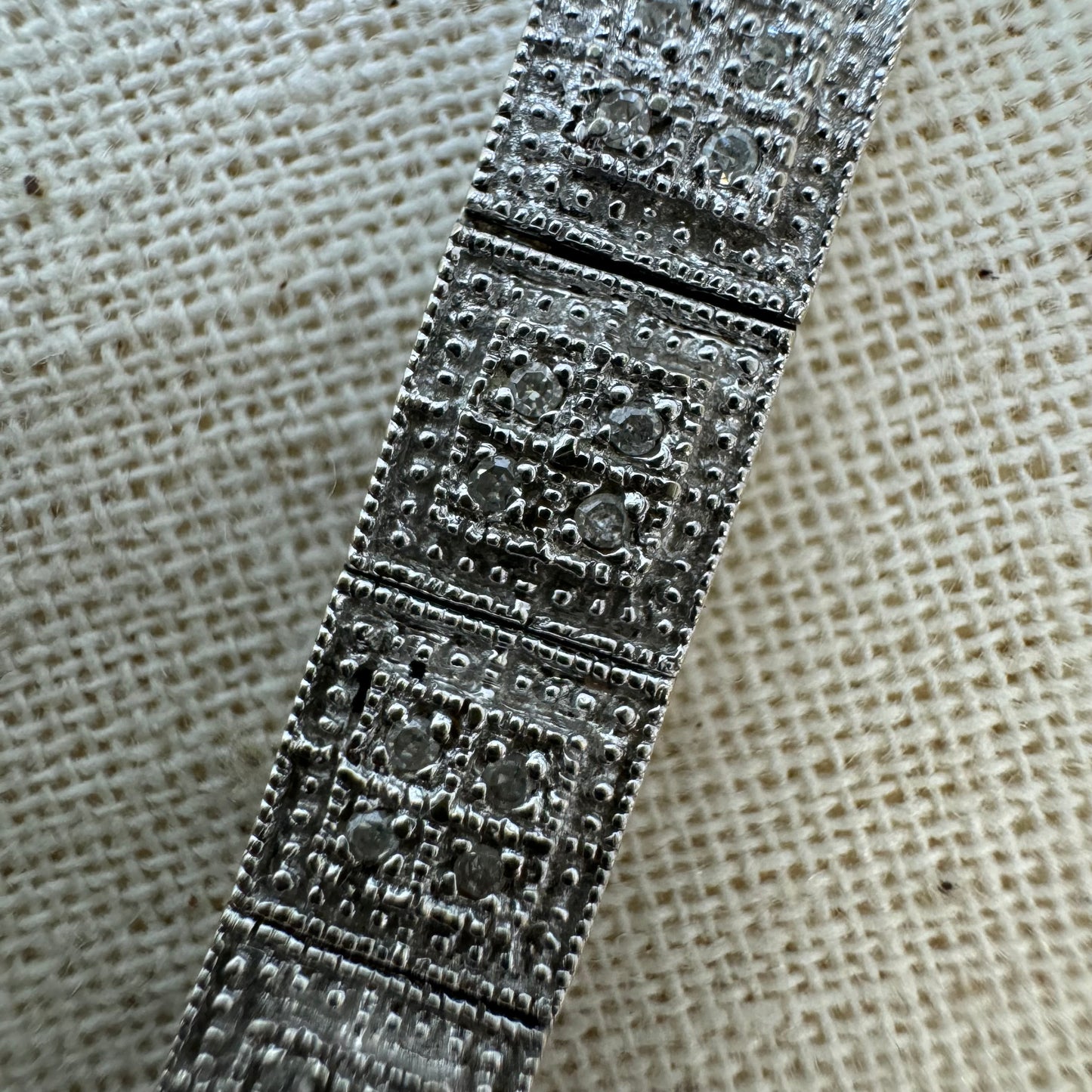 14K gold bracelet set with square links adorned with pavé-set Diamonds