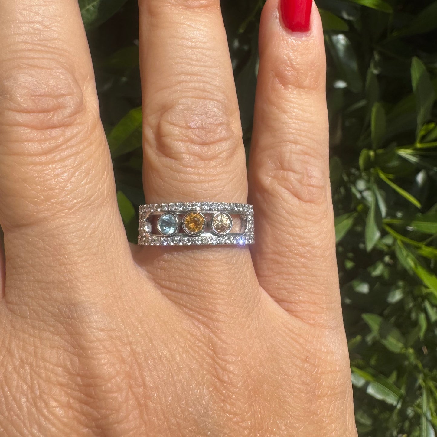14K gold ring set with Blue Topaz, Citrine, and Rose Quartz, framed by a pave’ of sparkling diamonds