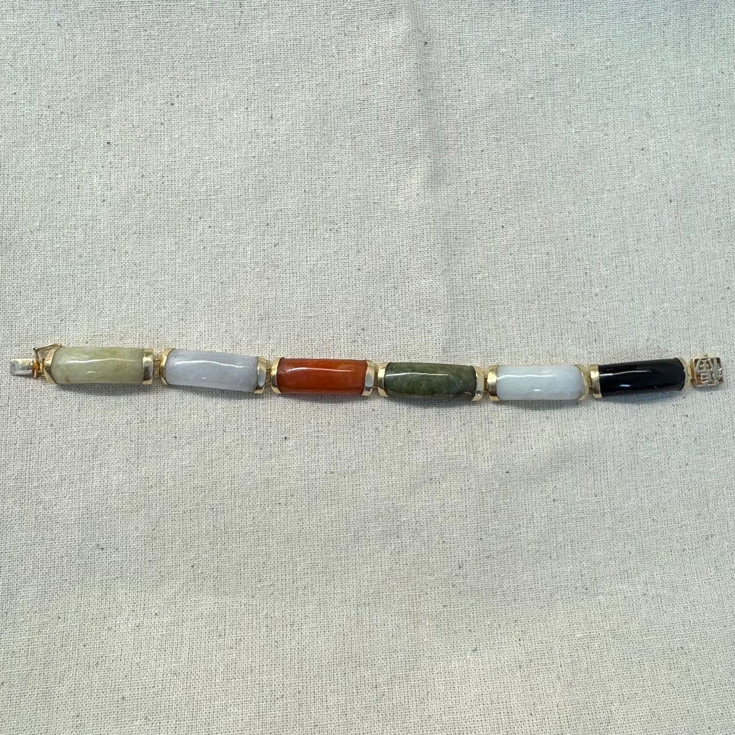14K gold bracelet set with various gemstones