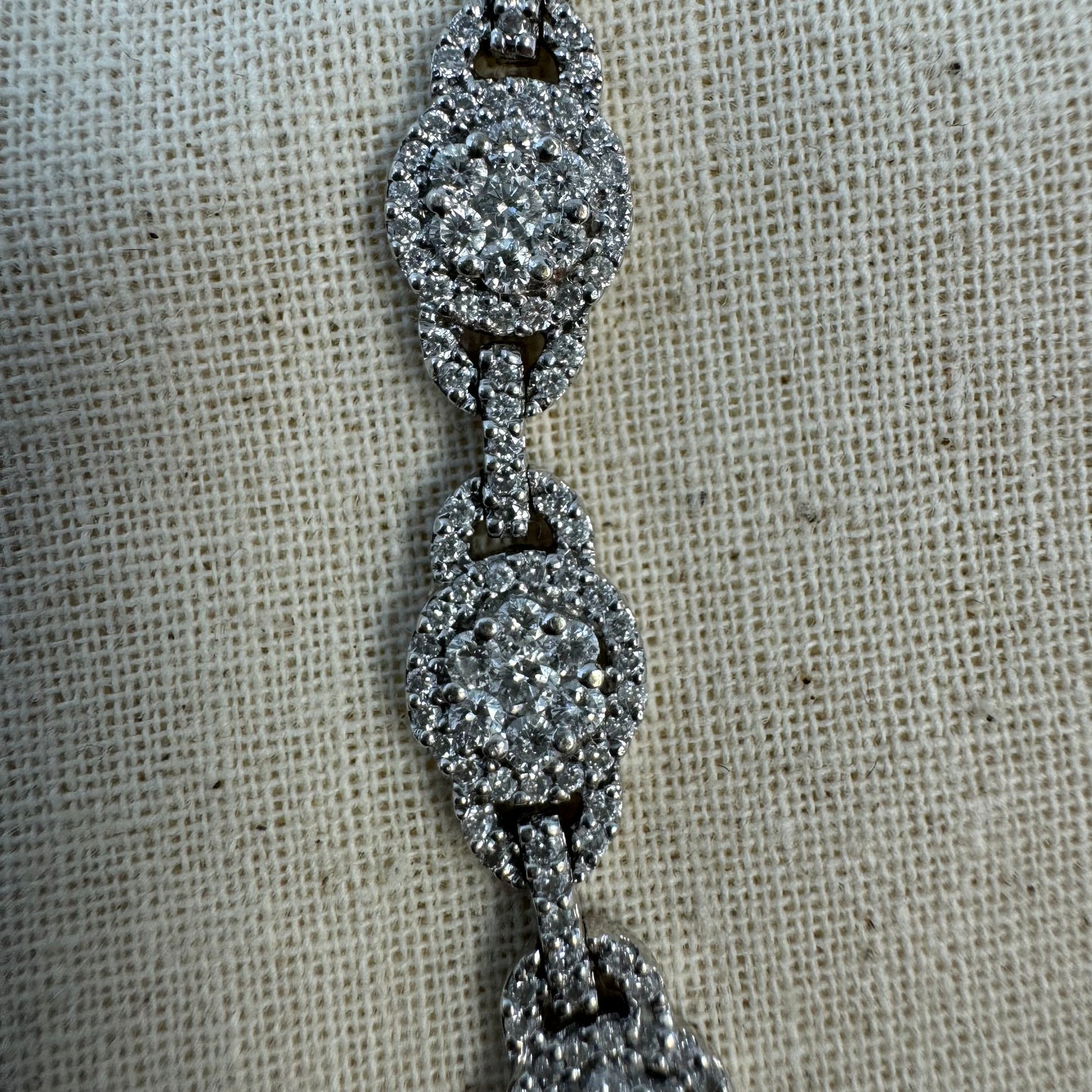 14K gold Tennis bracelet set rows of sparkling Diamonds in a dazzling halo design