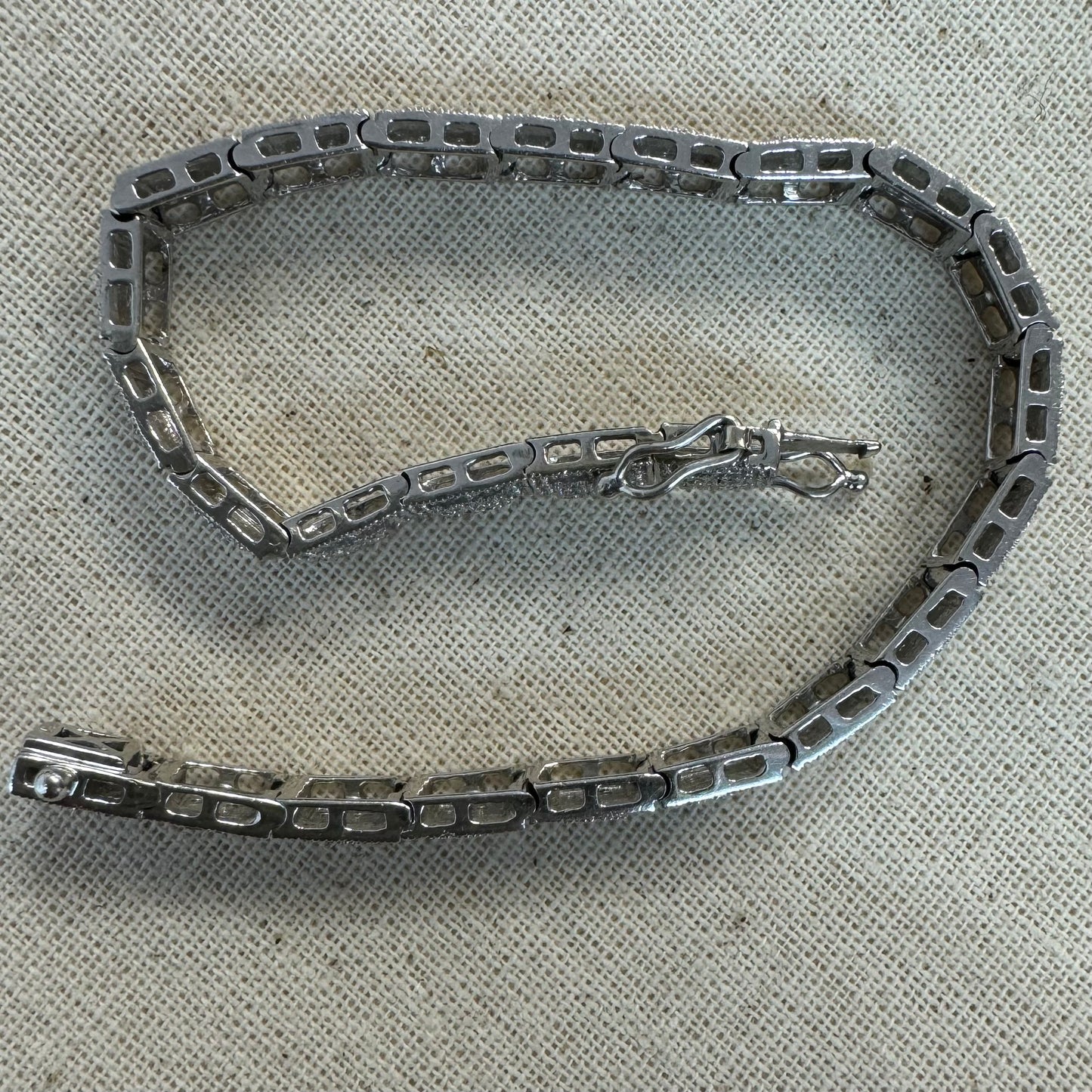 14K gold bracelet set with square links adorned with pavé-set Diamonds