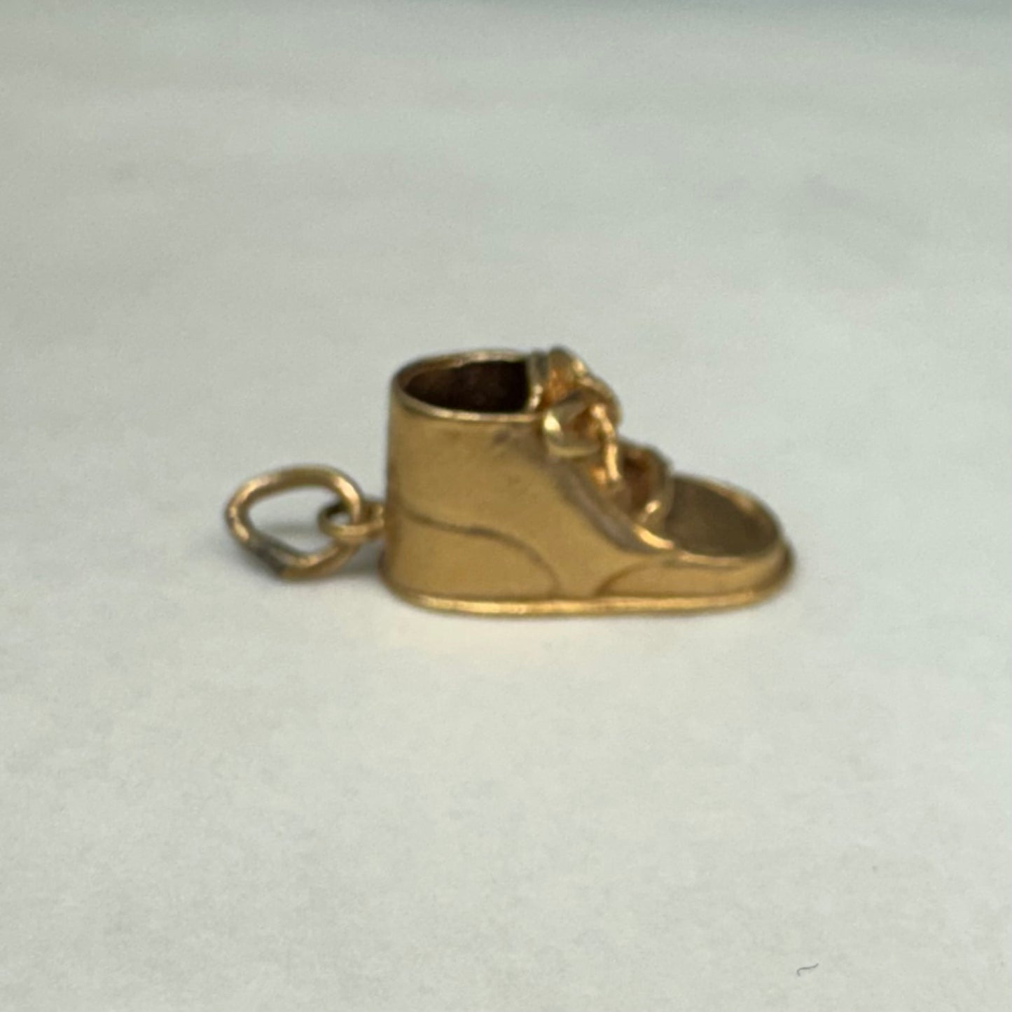 14K yellow gold baby shoe pendant