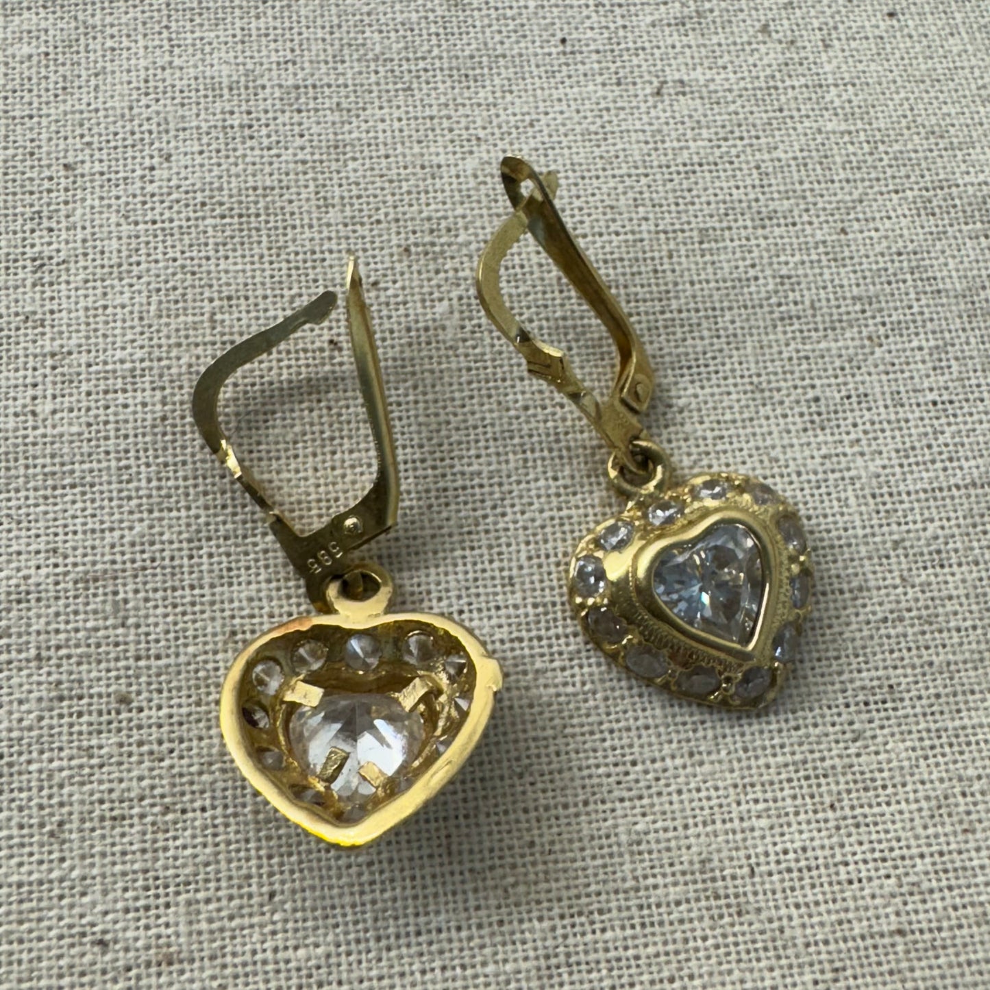 14K gold drop earrings set with transparent gemstones