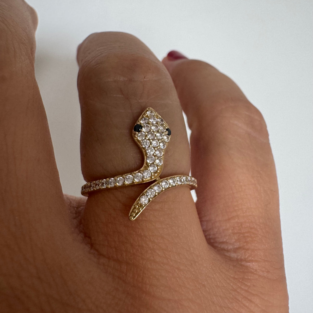 14K Gold Snake Ring with White Stones and Sapphire Eyes