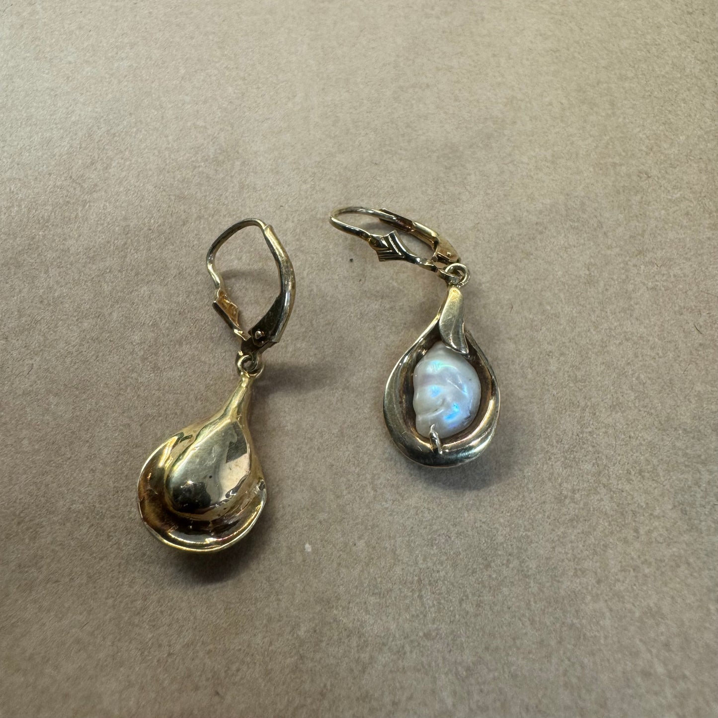 14K gold drop earrings featuring baroque Pearls set in fluid, organic shape