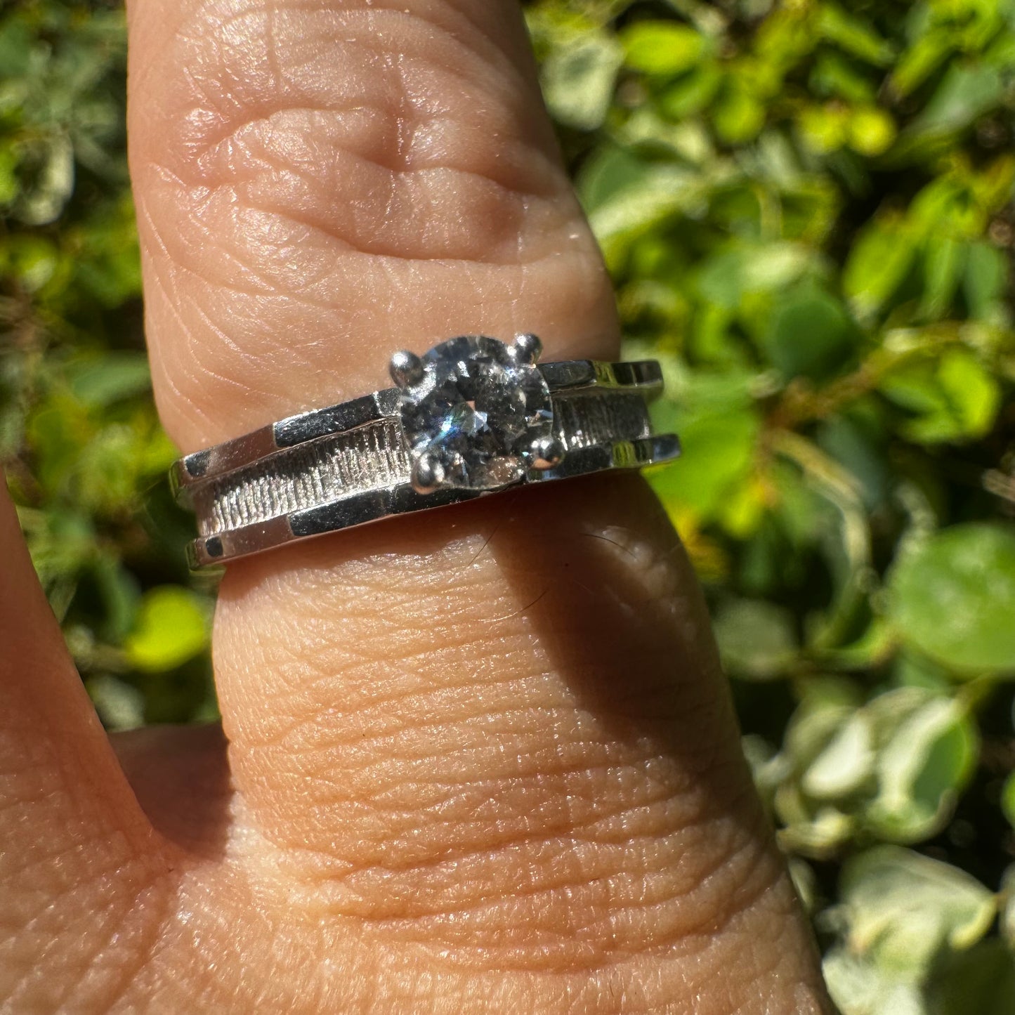 14K gold ring set with one center Diamond