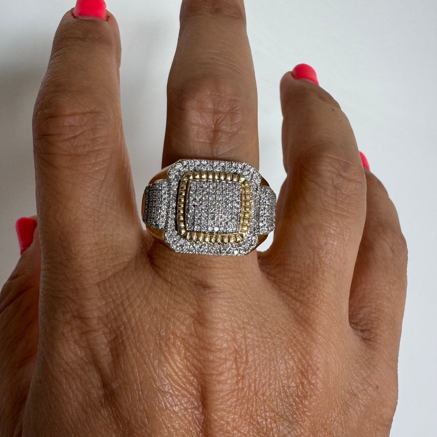 10K gold ring set with sparkling Diamonds in a bold geometric design.