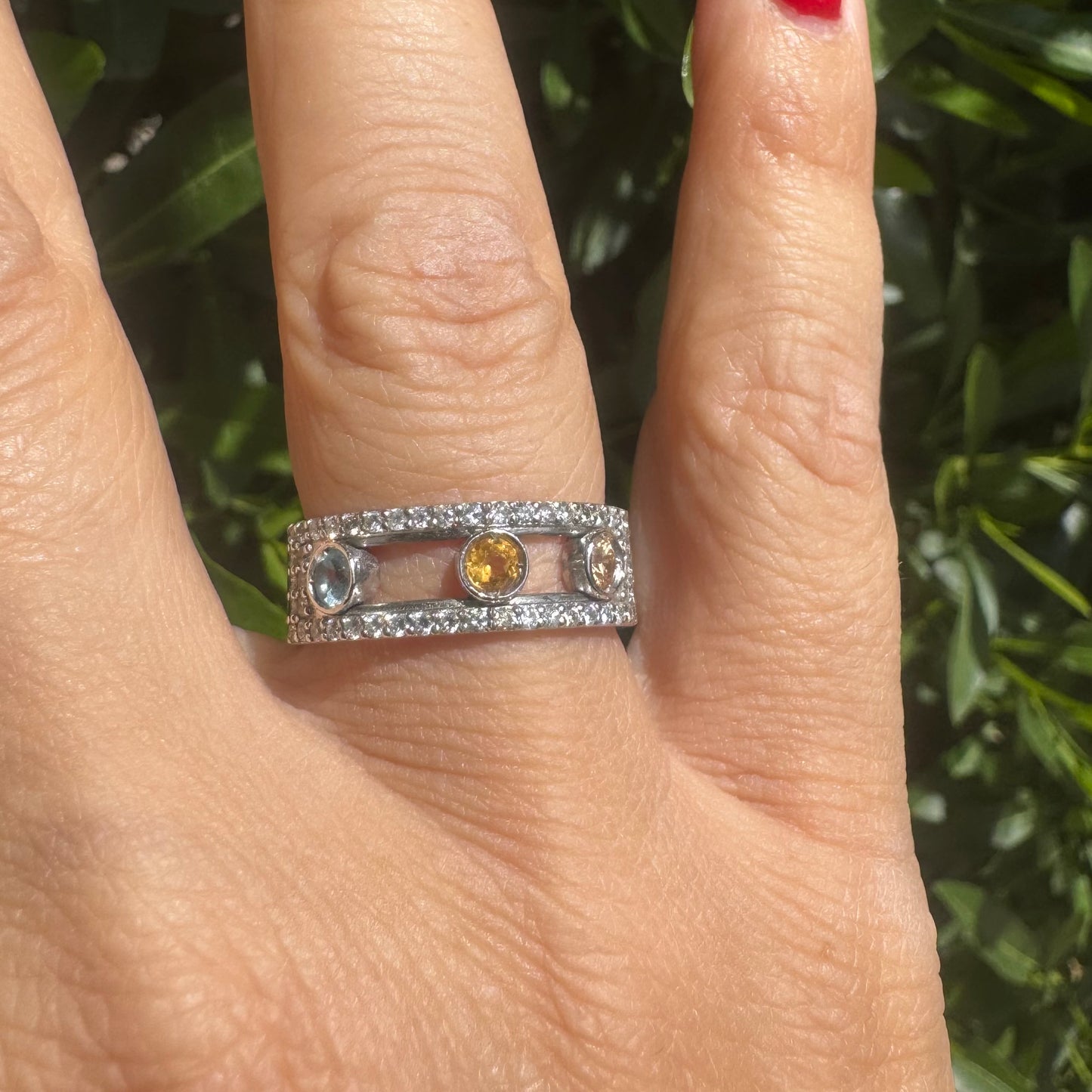 14K gold ring set with Blue Topaz, Citrine, and Rose Quartz, framed by a pave’ of sparkling diamonds