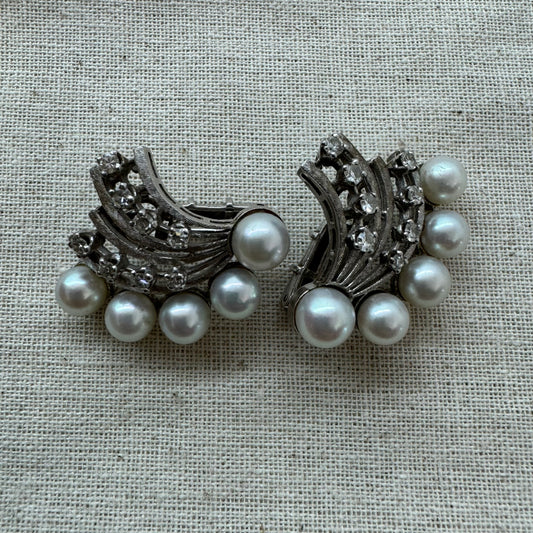 14K gold clip-on earrings set with lustrous pearls & sparkling Diamonds