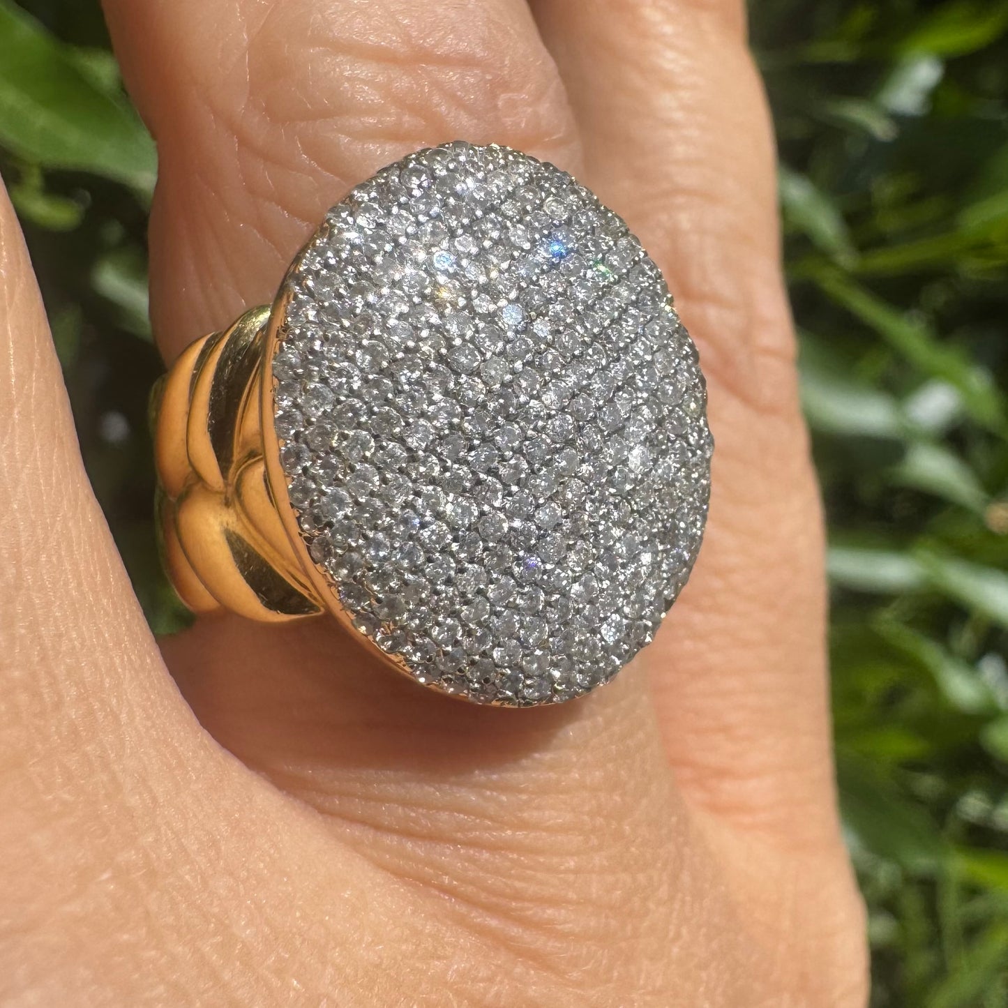 18K gold ring set with a dazzling dome of pavé-set diamonds