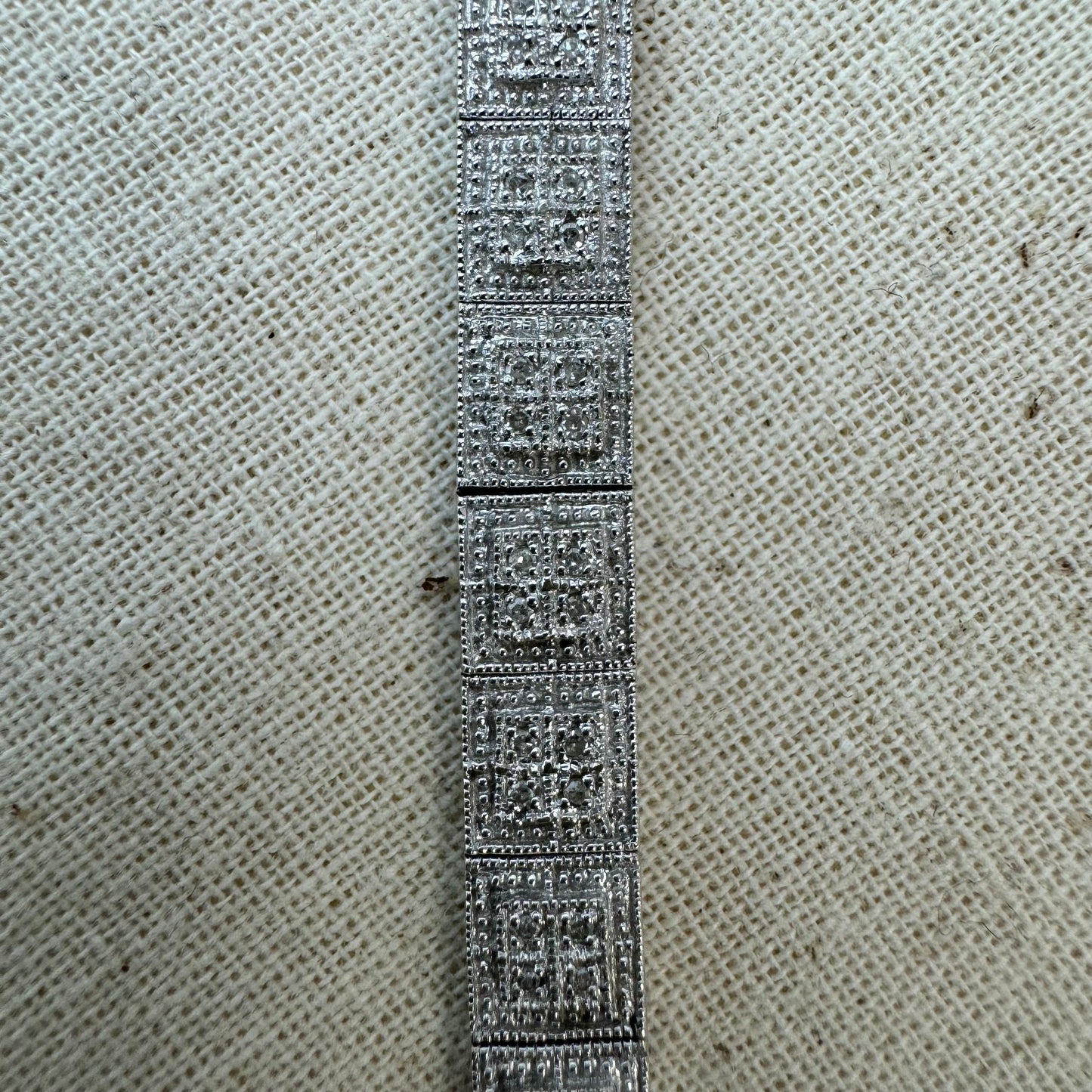 14K gold bracelet set with square links adorned with pavé-set Diamonds