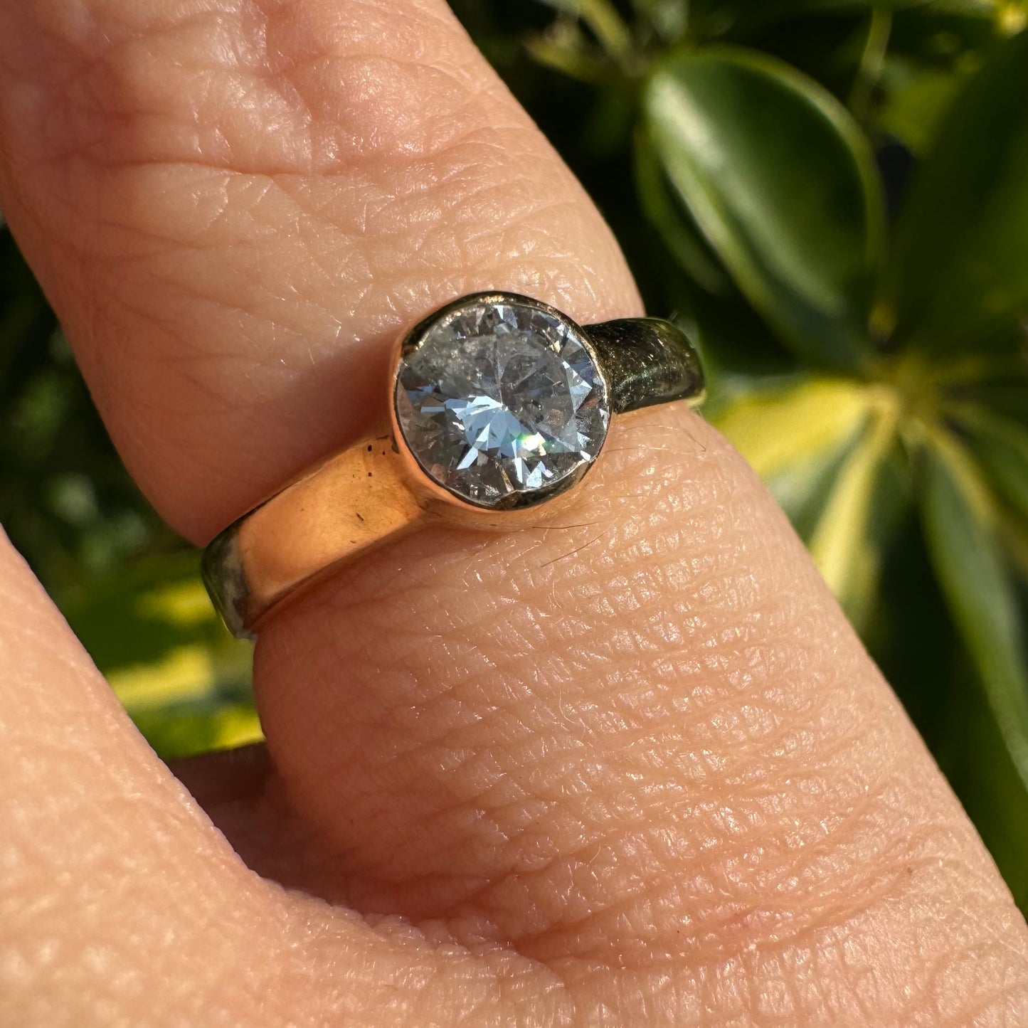 14K gold ring set with one center Diamond