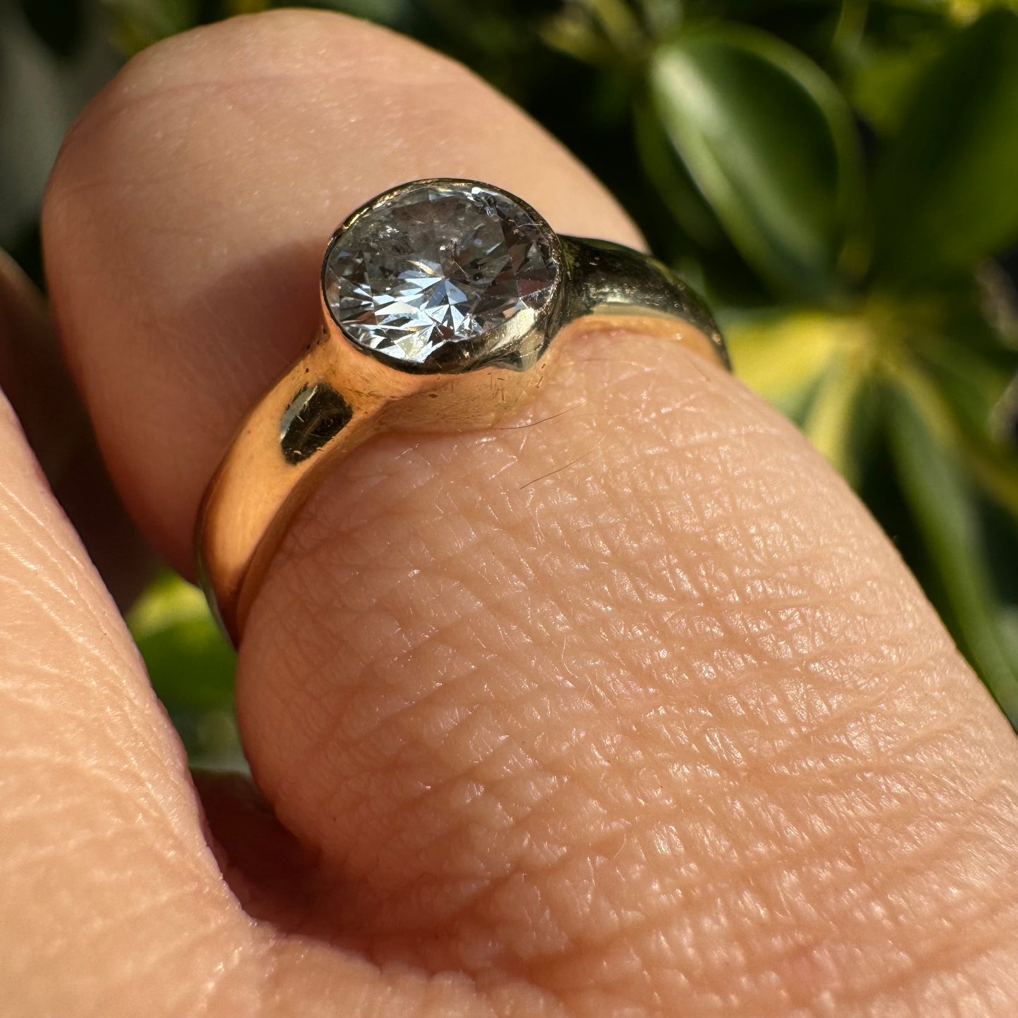 14K gold ring set with one center Diamond