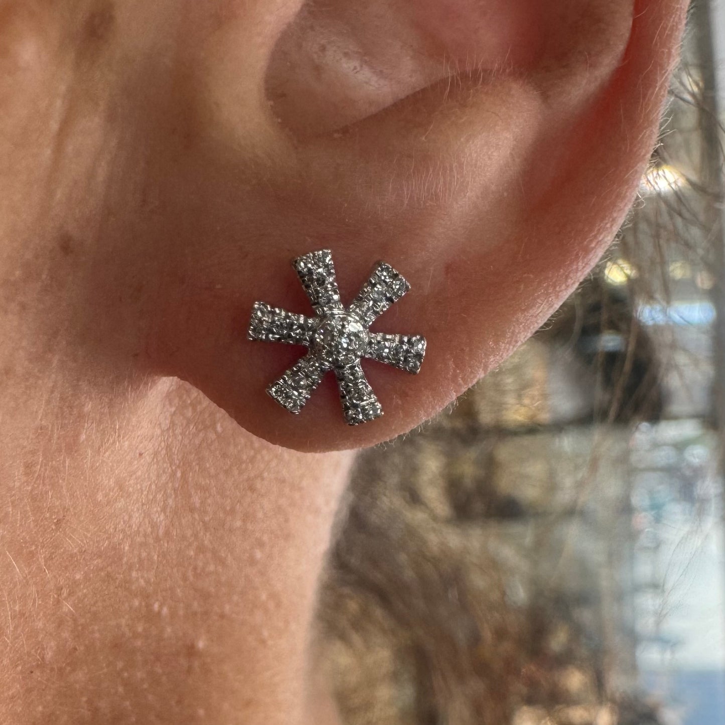 14K gold stud earrings set with Diamonds