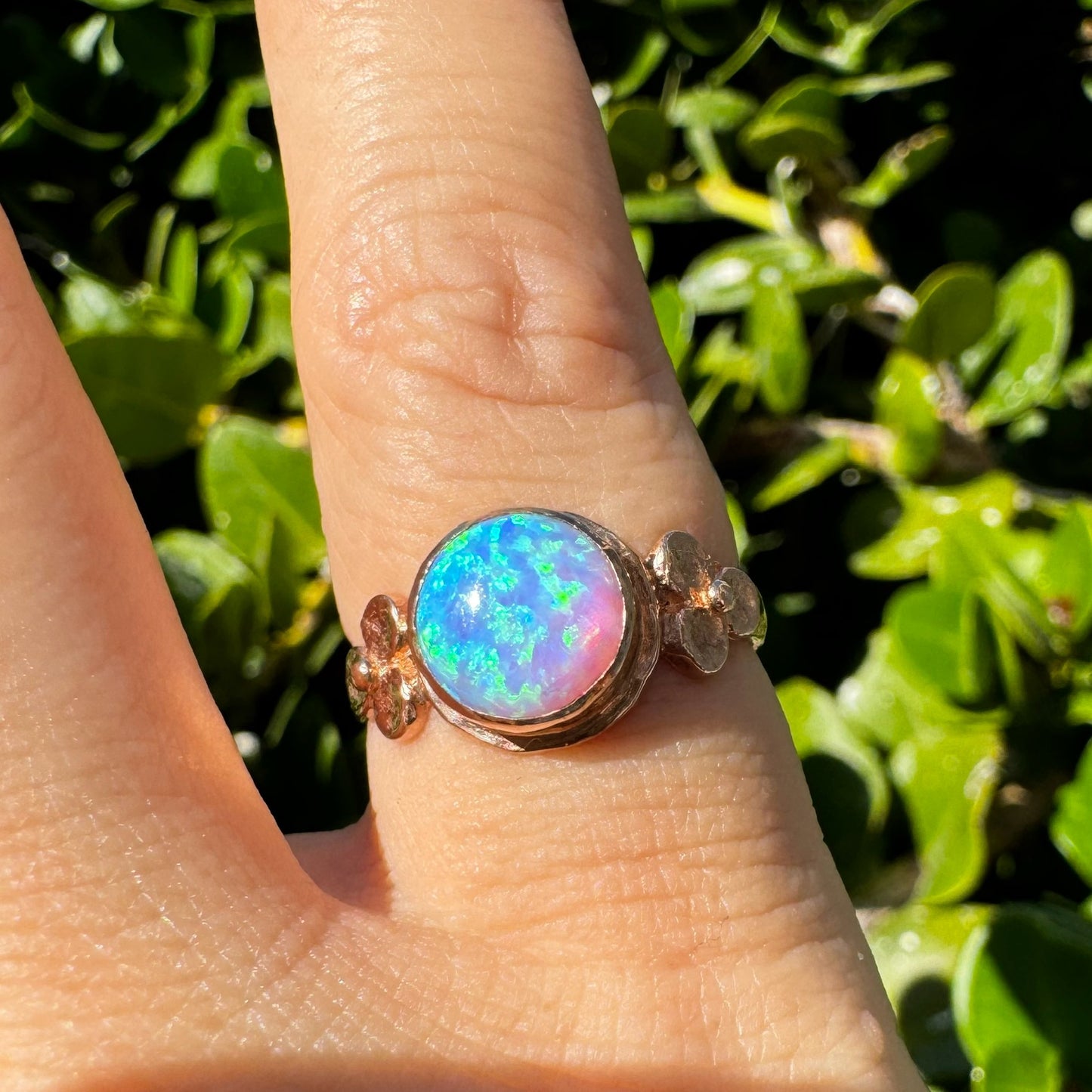 10K gold ring set with round Opal with vibrant flashes of blue, green and white