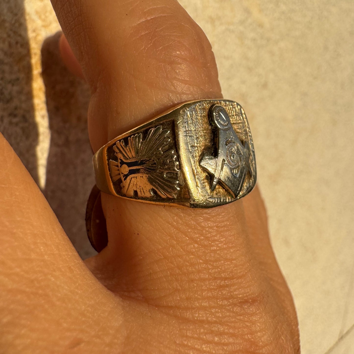 14K gold vintage Masonic ring featuring the iconic square and compass emblem.