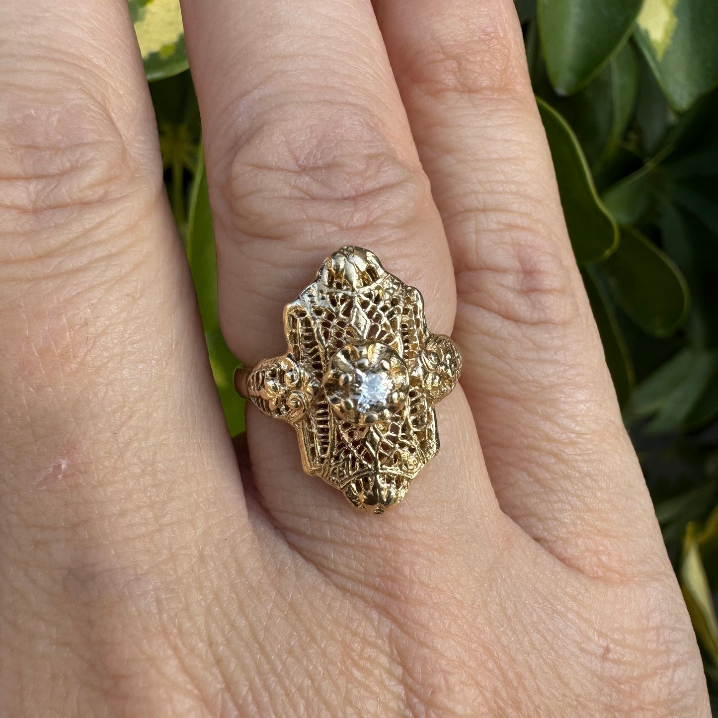 14K gold filigree ring set with an old-cut Diamond