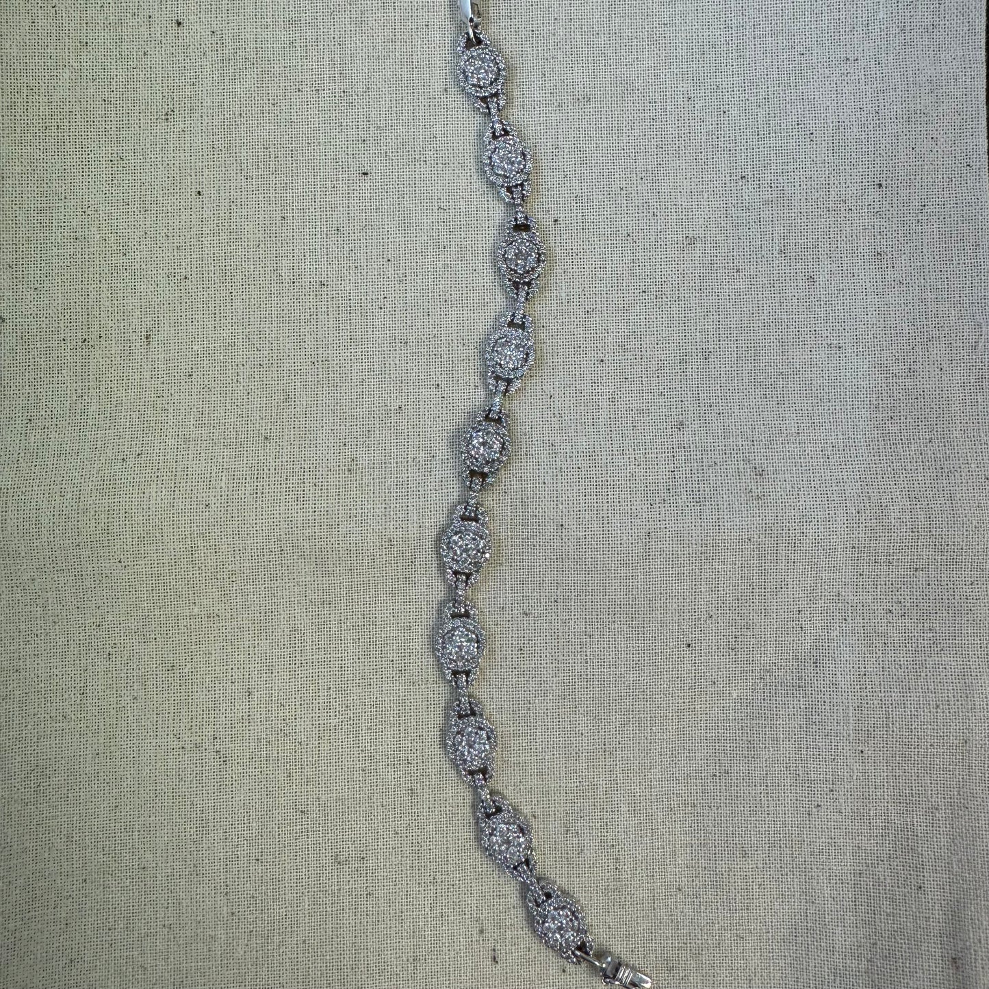 14K gold Tennis bracelet set rows of sparkling Diamonds in a dazzling halo design