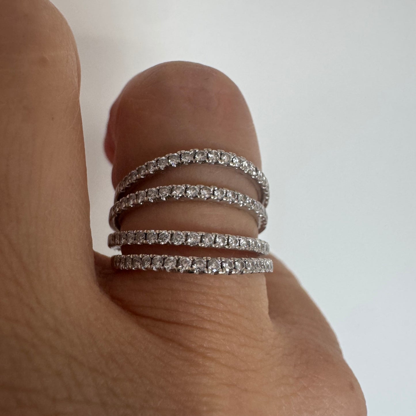 14K gold ring designed with multiple rows of sparkling Diamonds