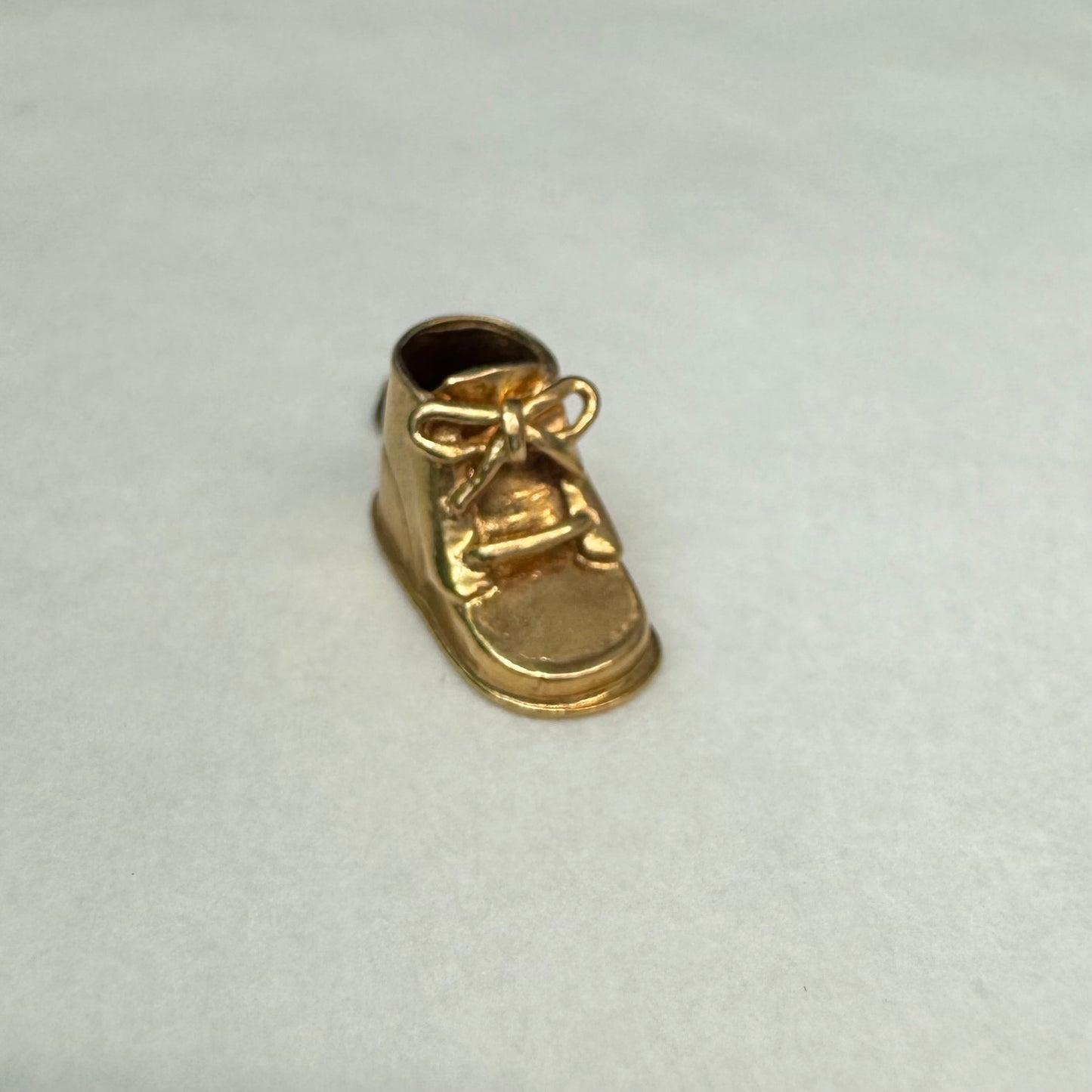 14K yellow gold baby shoe pendant