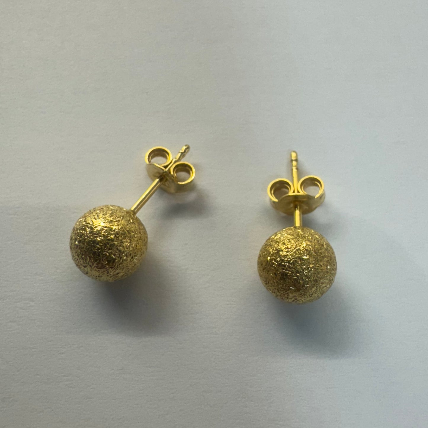 18K gold stud earrings