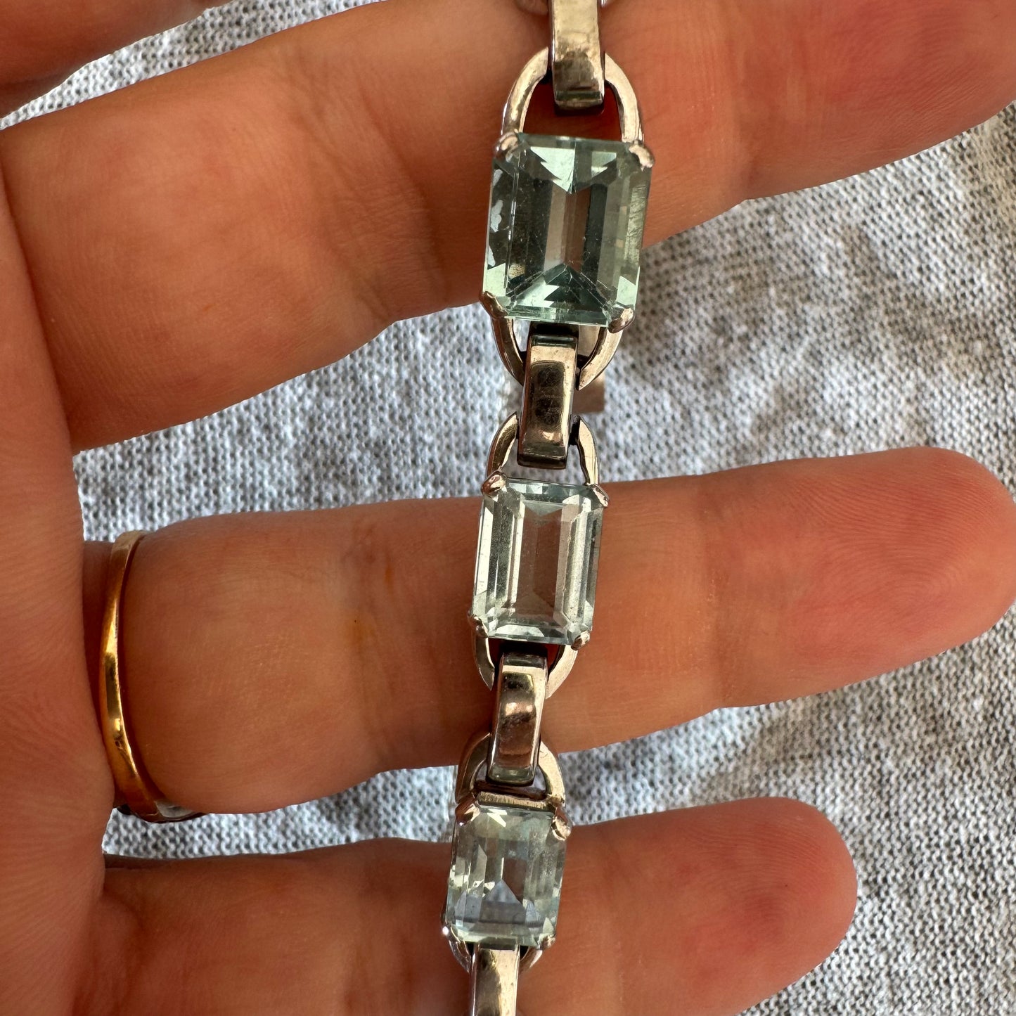 18K white gold bracelet set with large emerald-cut Aquamarine stones — elegant, radiant, and timeless.