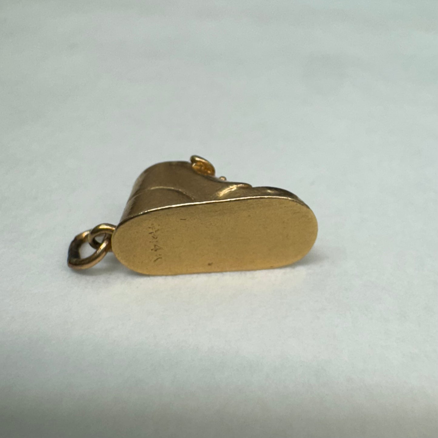 14K yellow gold baby shoe pendant