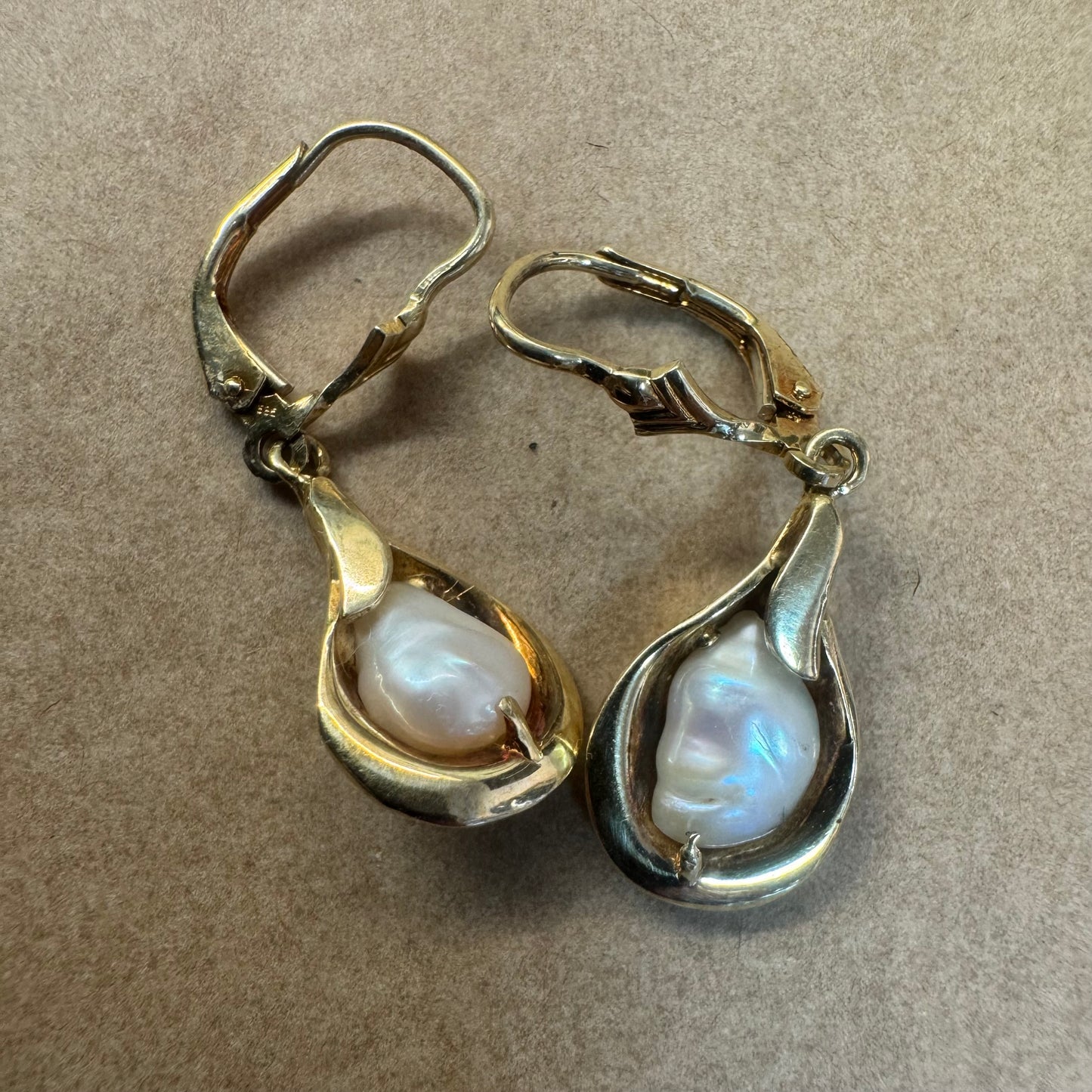14K gold drop earrings featuring baroque Pearls set in fluid, organic shape