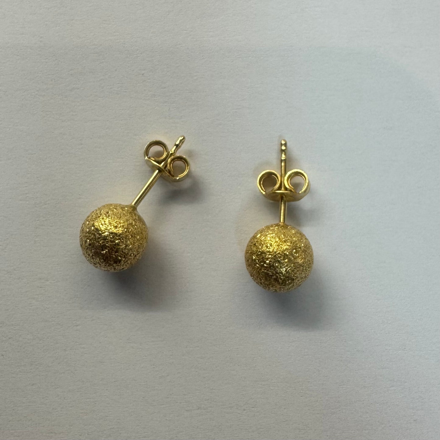 18K gold stud earrings