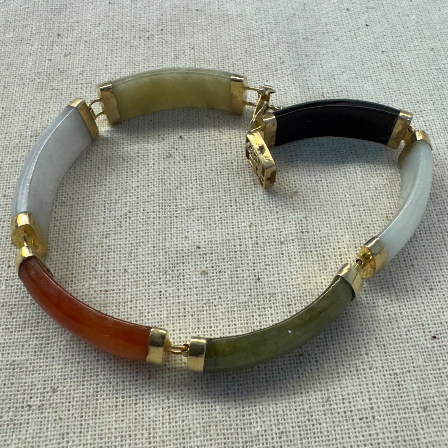 14K gold bracelet set with various gemstones