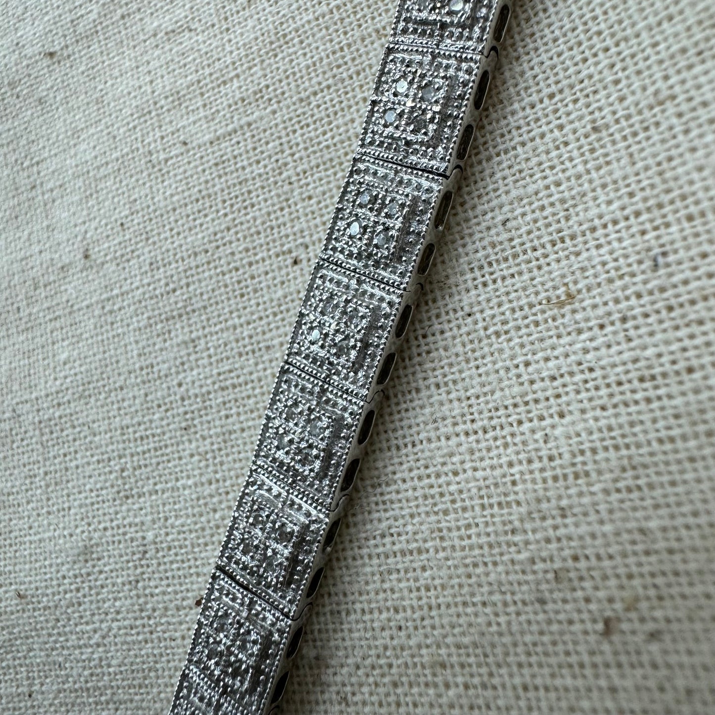 14K gold bracelet set with square links adorned with pavé-set Diamonds