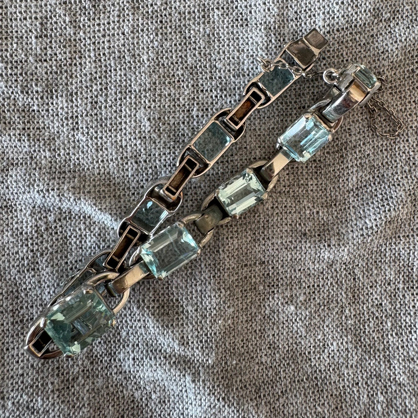 18K white gold bracelet set with large emerald-cut Aquamarine stones — elegant, radiant, and timeless.