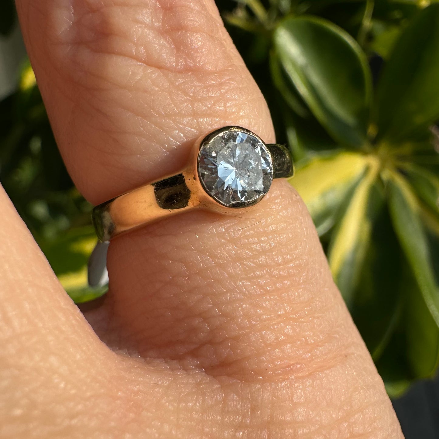 14K gold ring set with one center Diamond