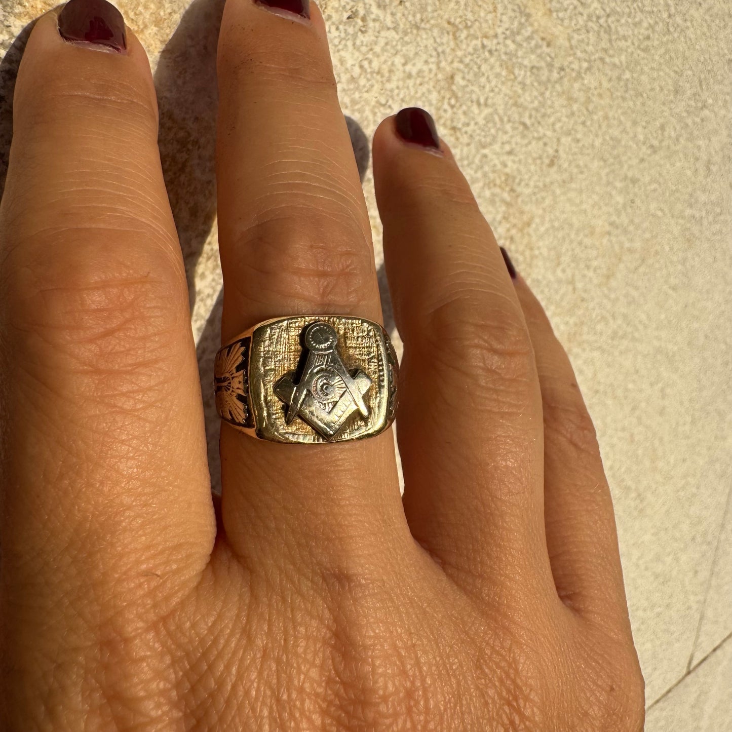 14K gold vintage Masonic ring featuring the iconic square and compass emblem.