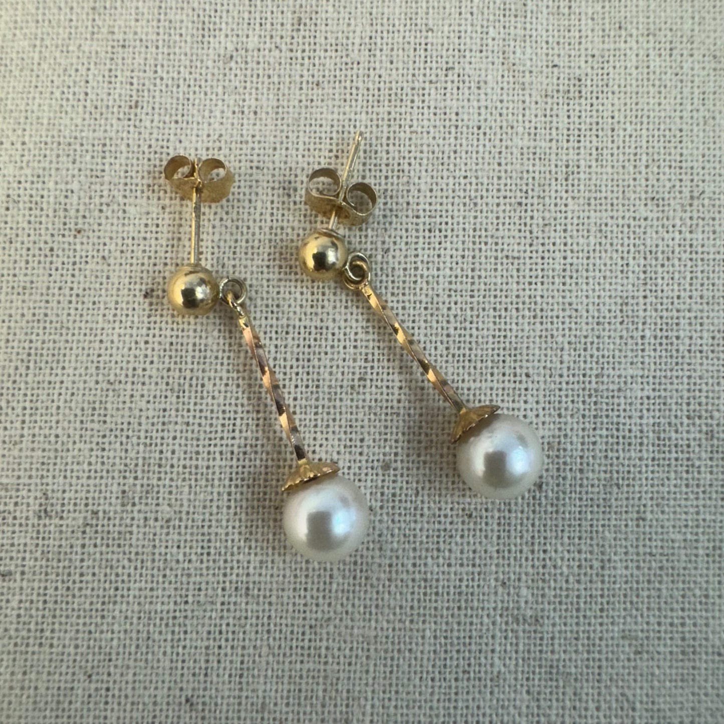 14K gold earrings set with Pearl