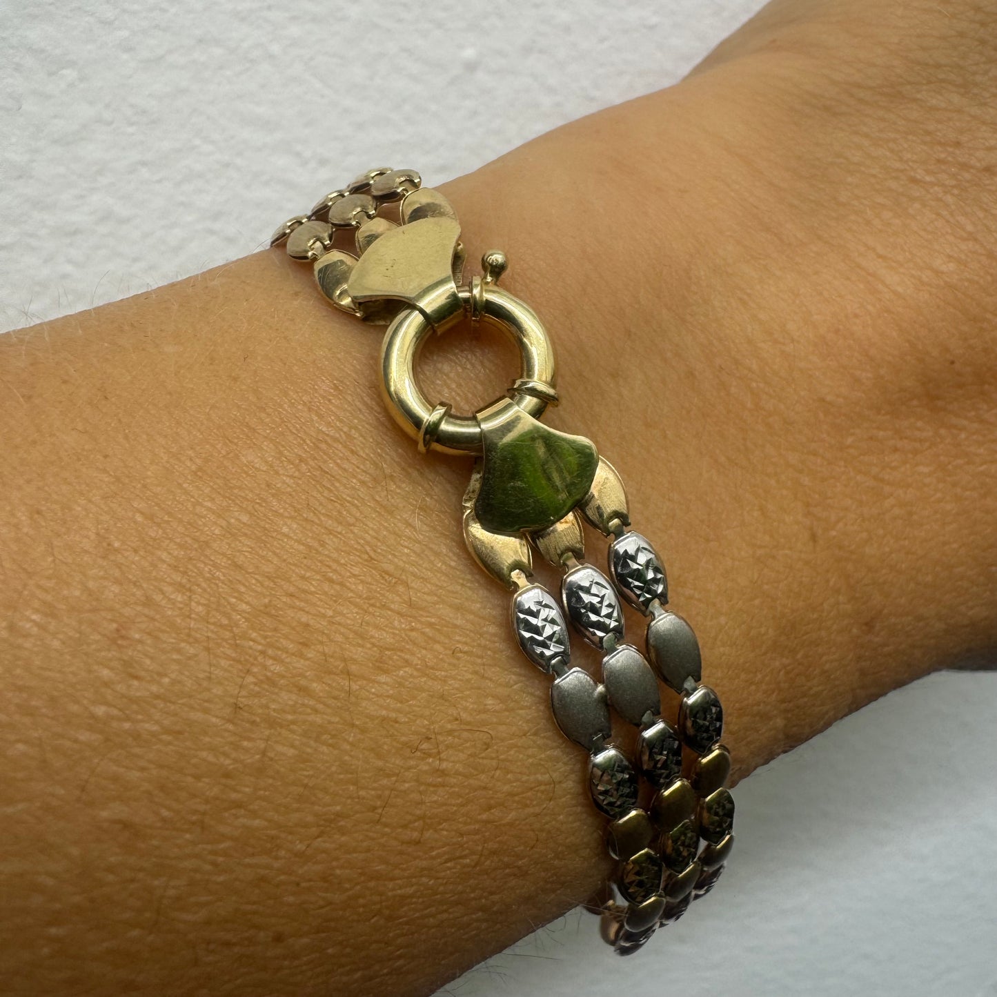 14K tri-color gold bracelet featuring yellow, white and rose gold links