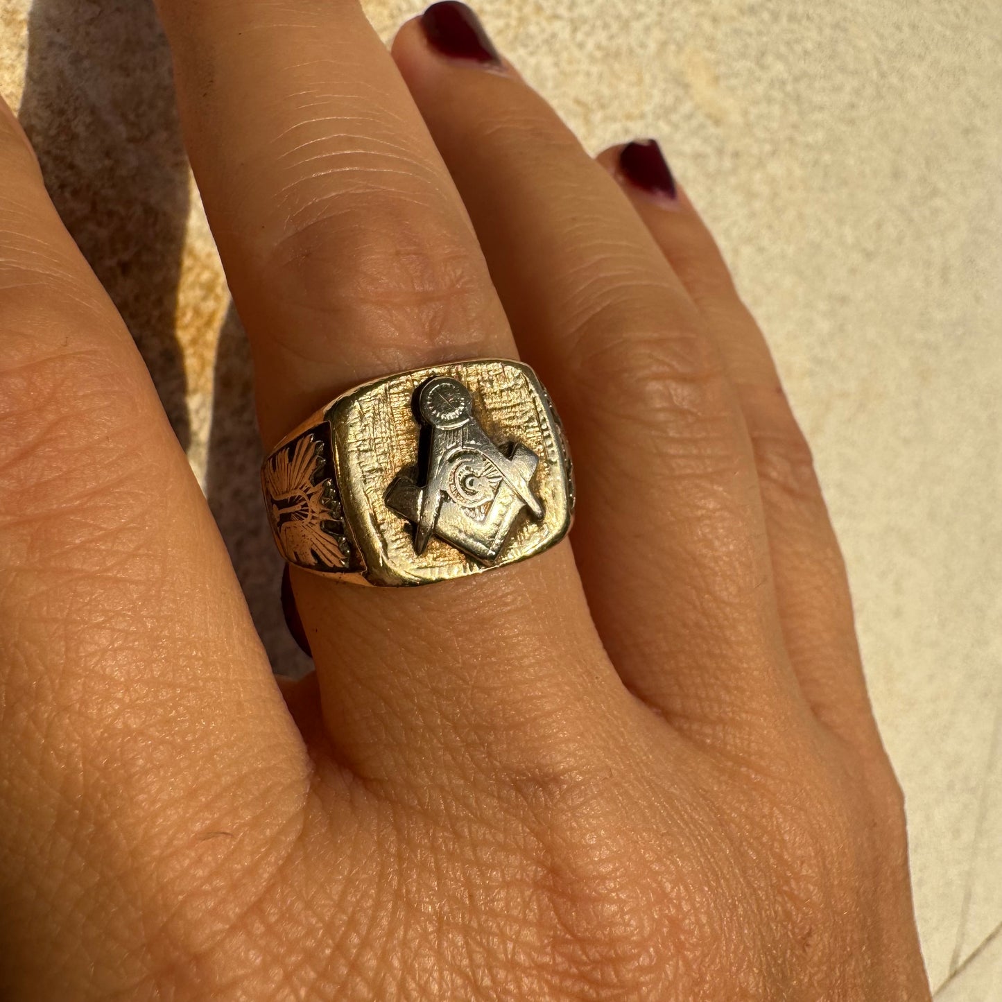 14K gold vintage Masonic ring featuring the iconic square and compass emblem.