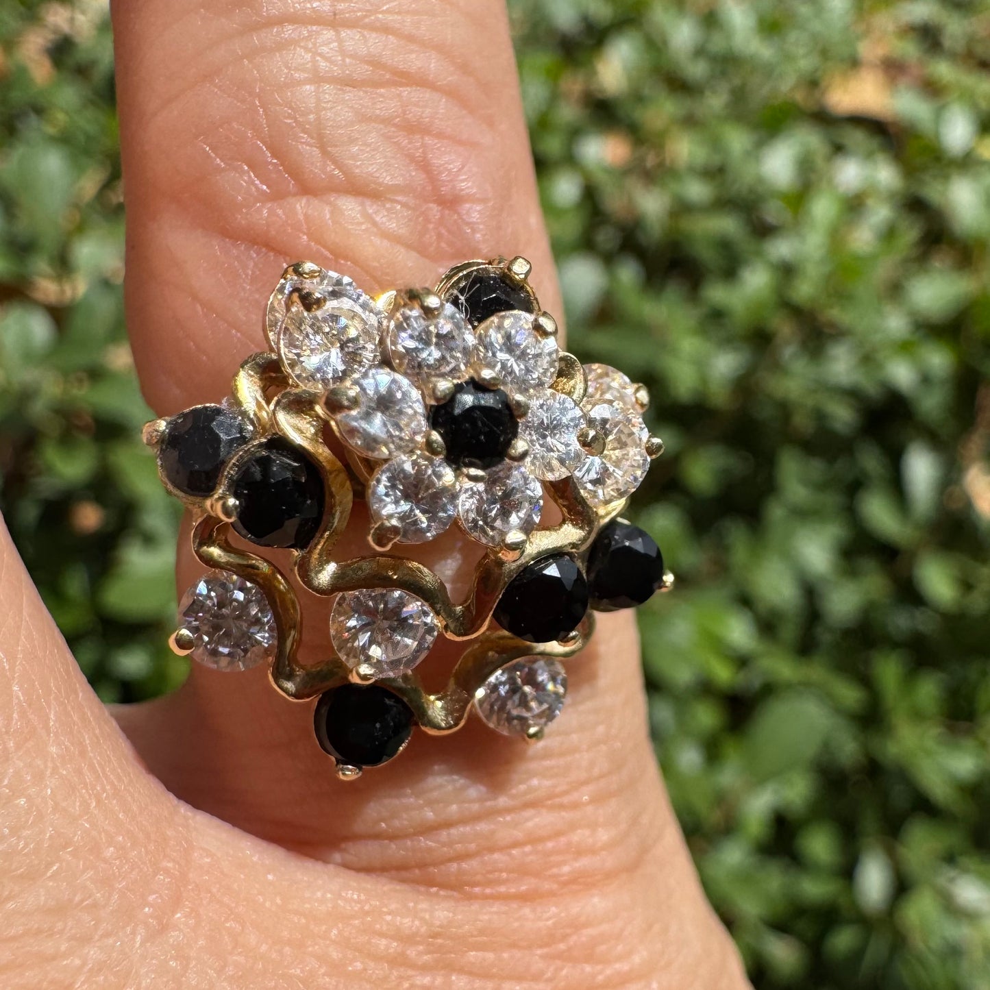 14K gold kinetic cocktail ring set with black and transparent stones