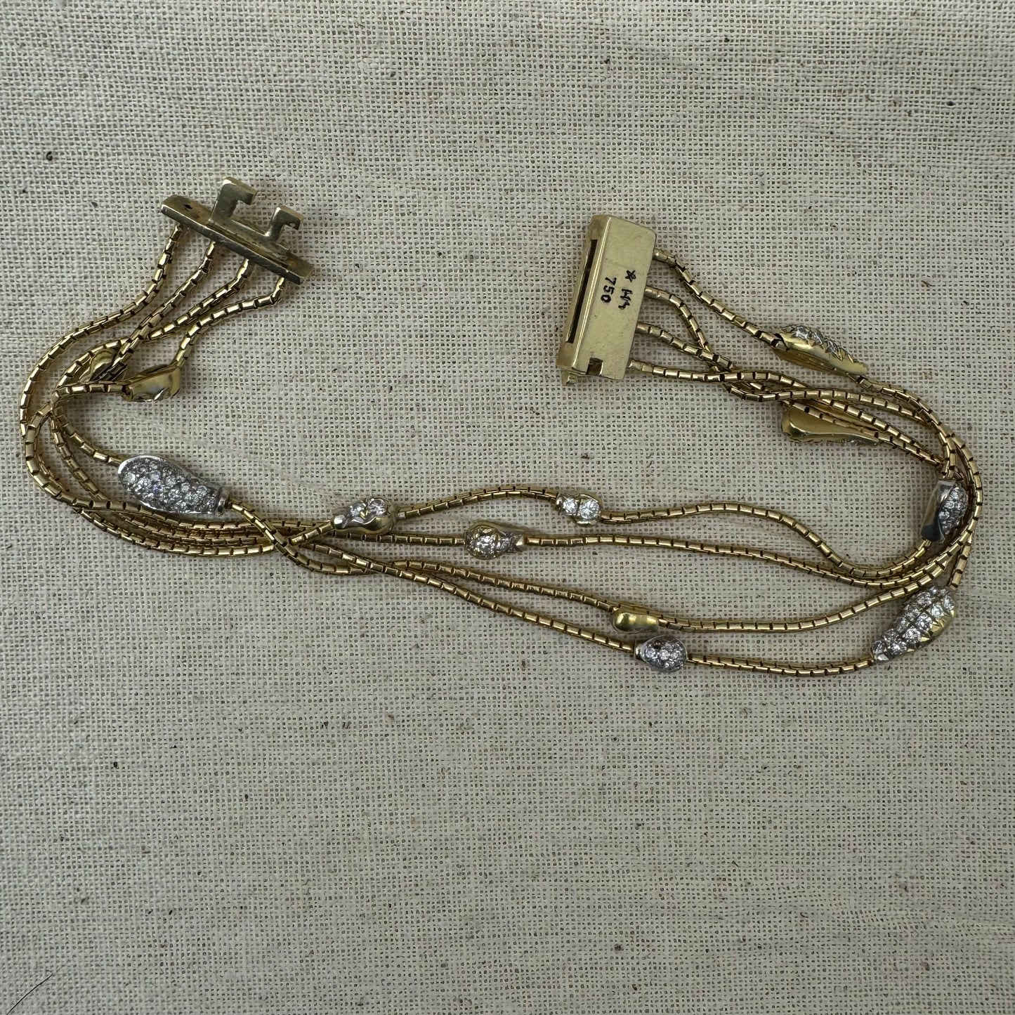 18K gold H.Stern delicate double-wrap gold bracelet adorned with sparkling Diamond-set elements