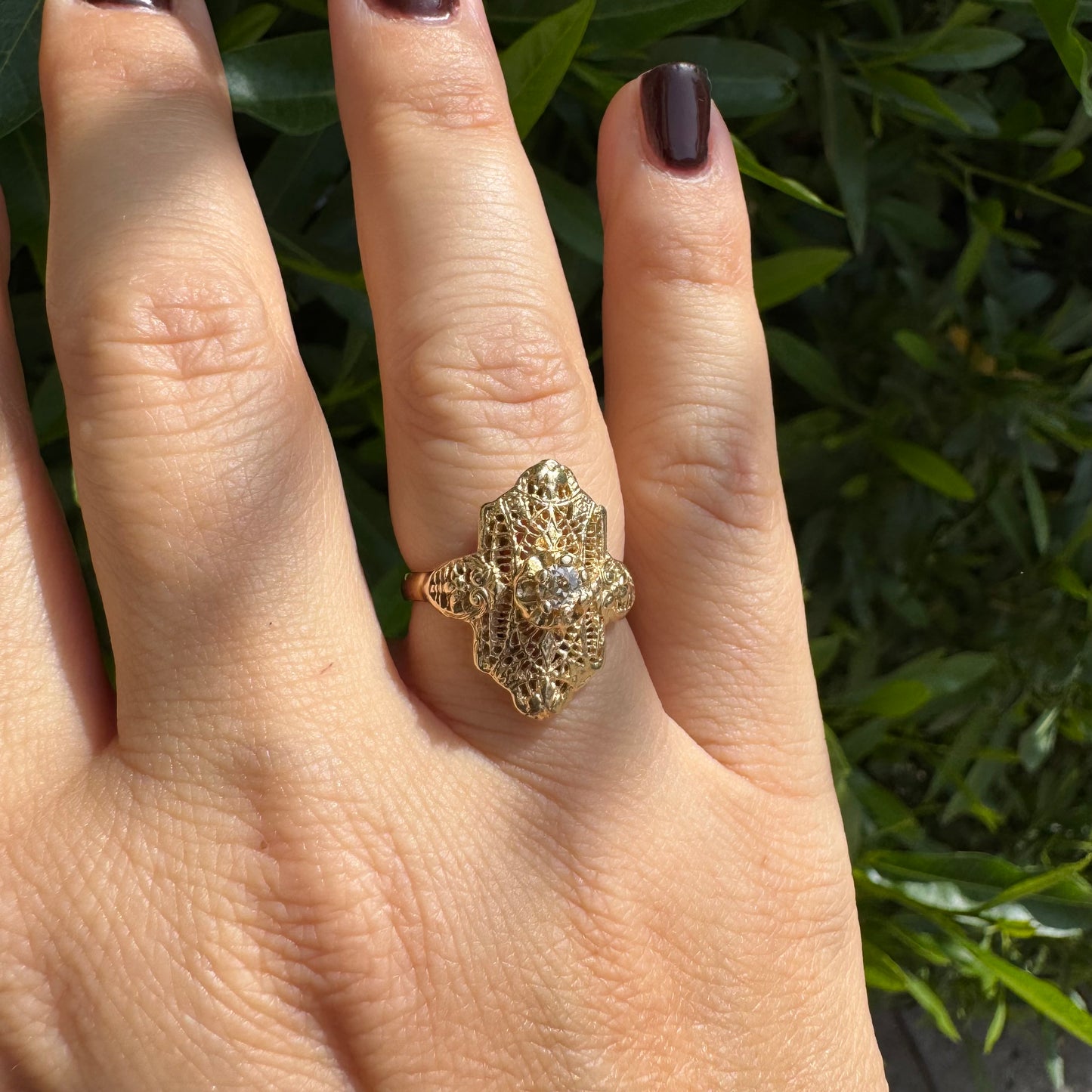 14K gold filigree ring set with an old-cut Diamond