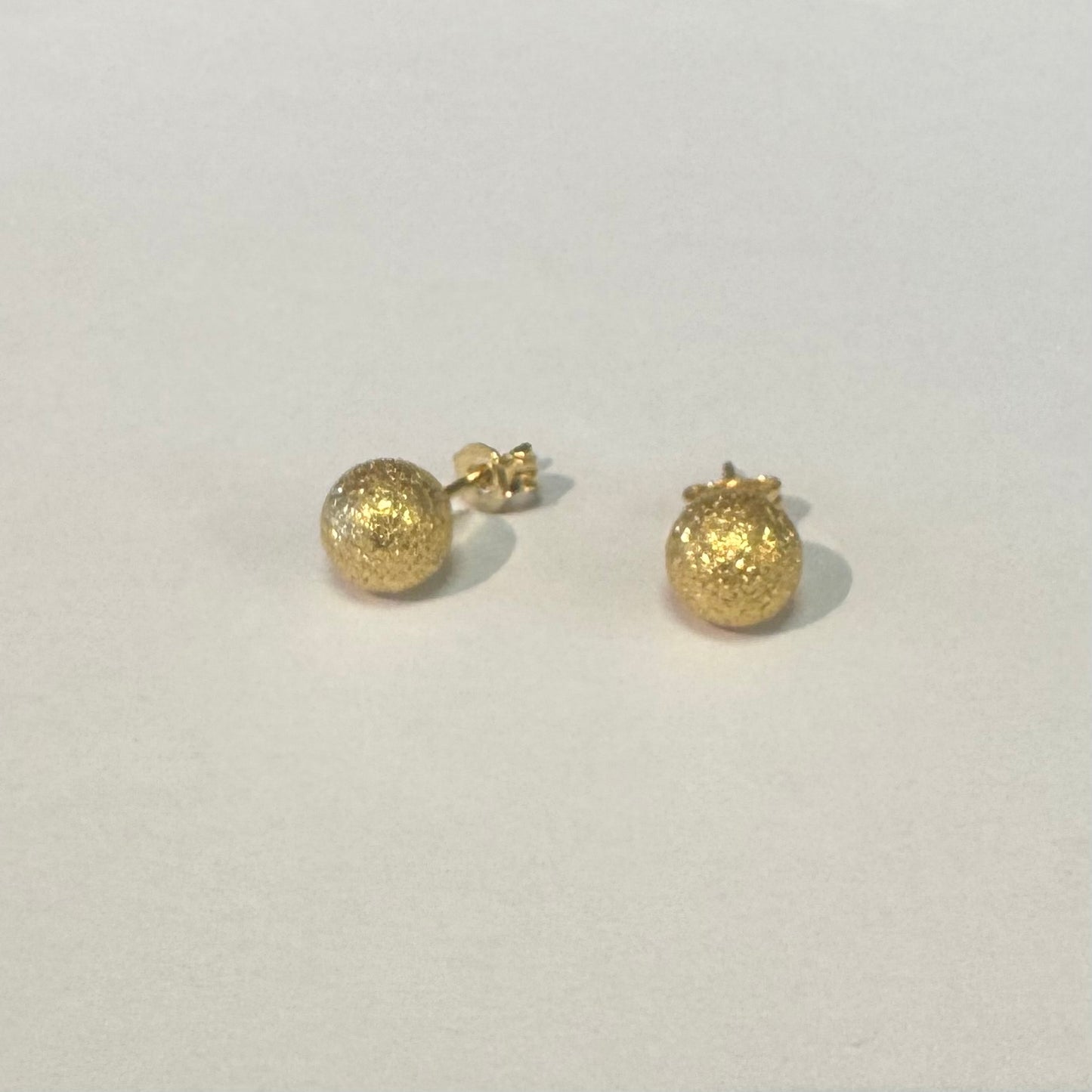 18K gold stud earrings