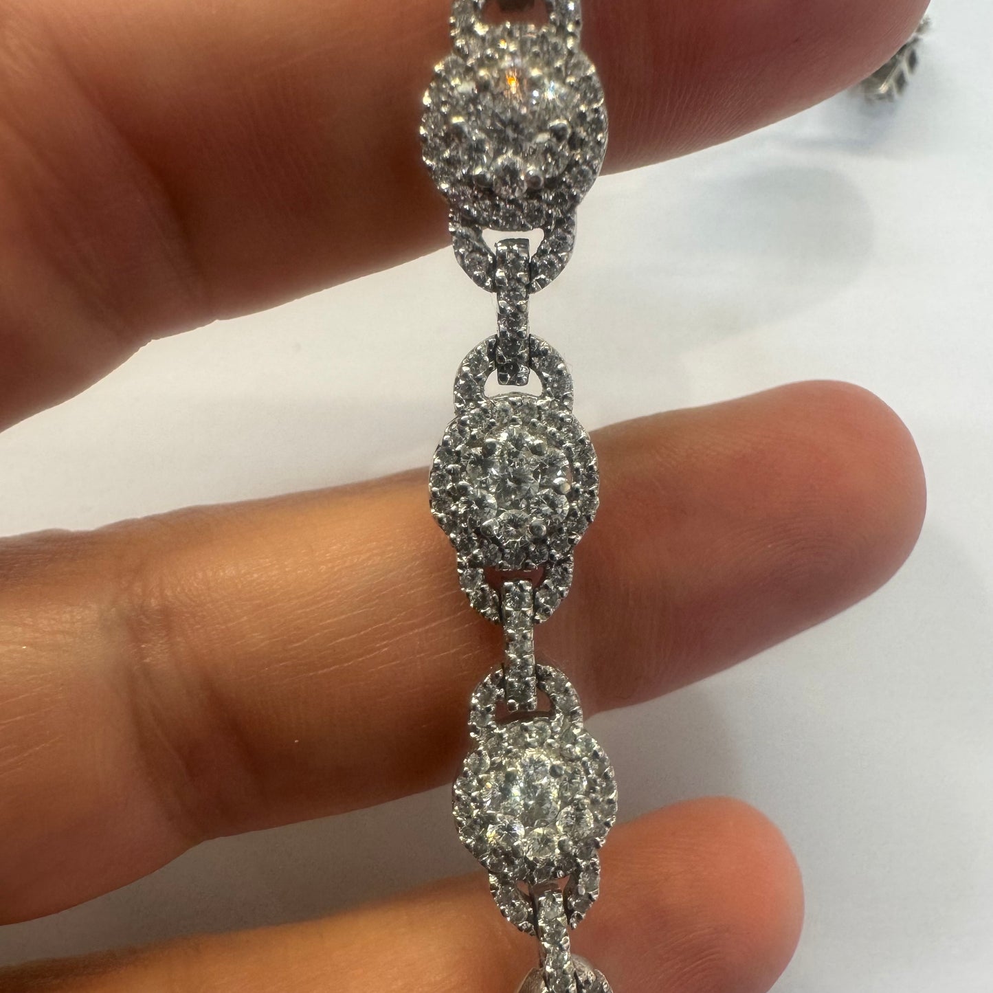 14K gold Tennis bracelet set rows of sparkling Diamonds in a dazzling halo design