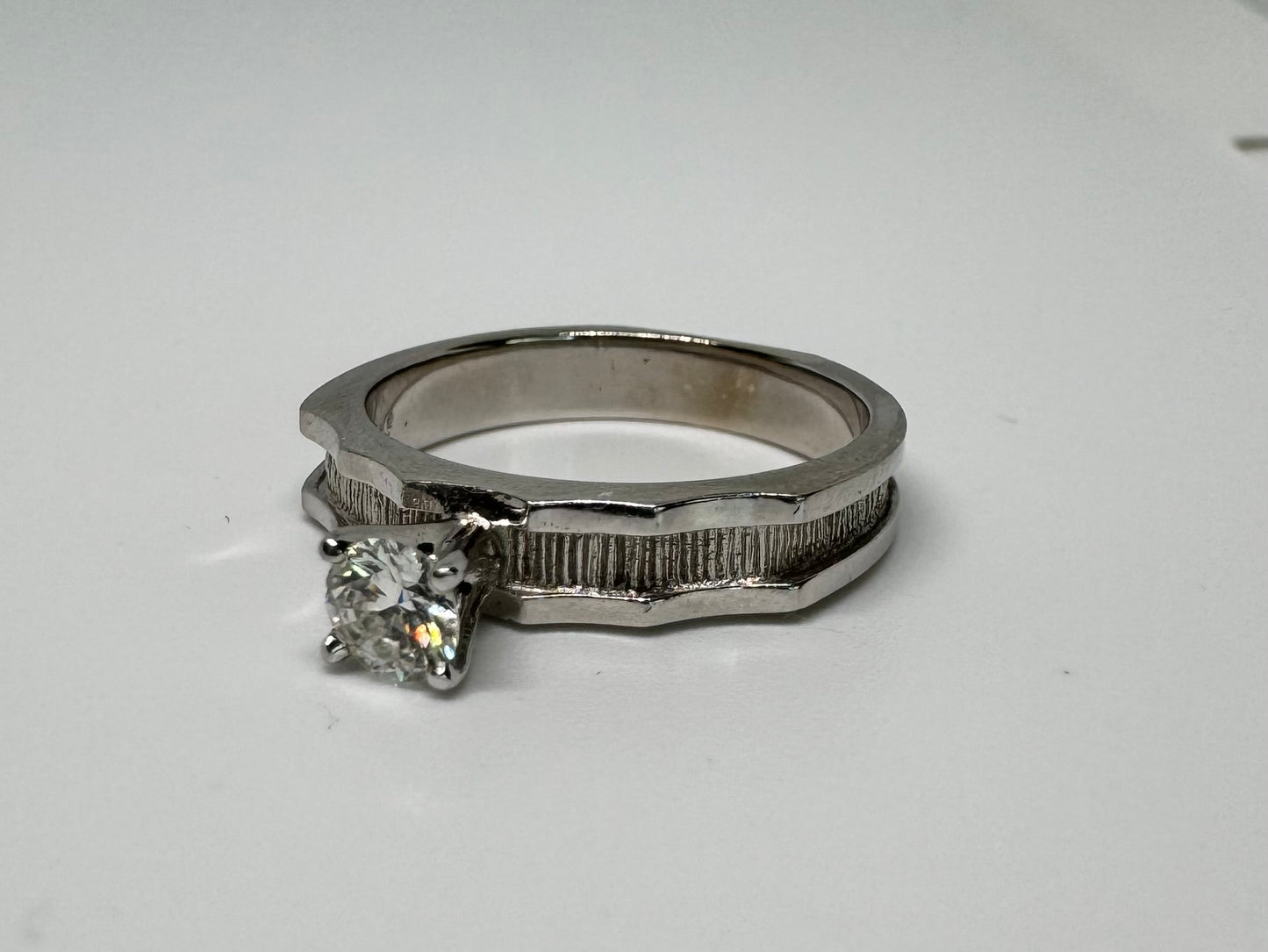 14K gold ring set with one center Diamond