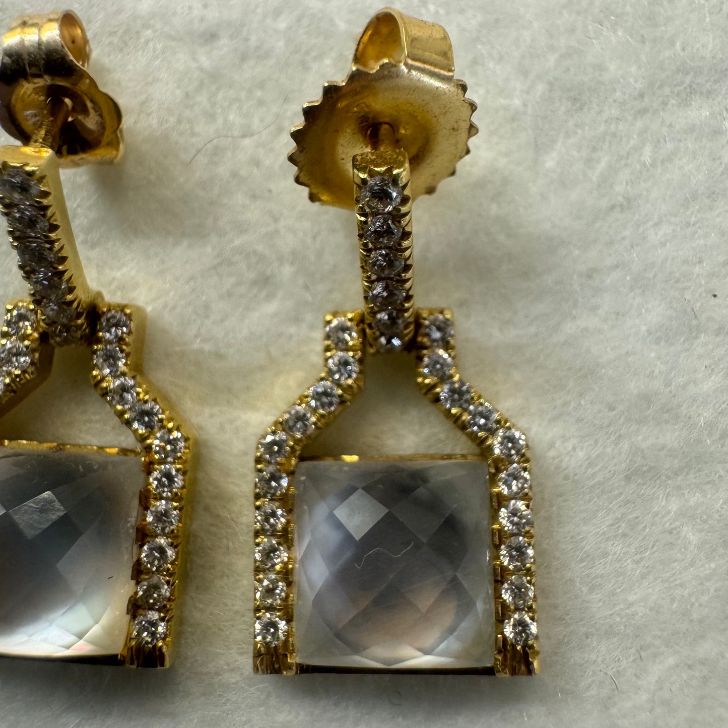 18K gold earrings featuring a cushion-cut translucent Gemstone, framed with sparkling Diamonds