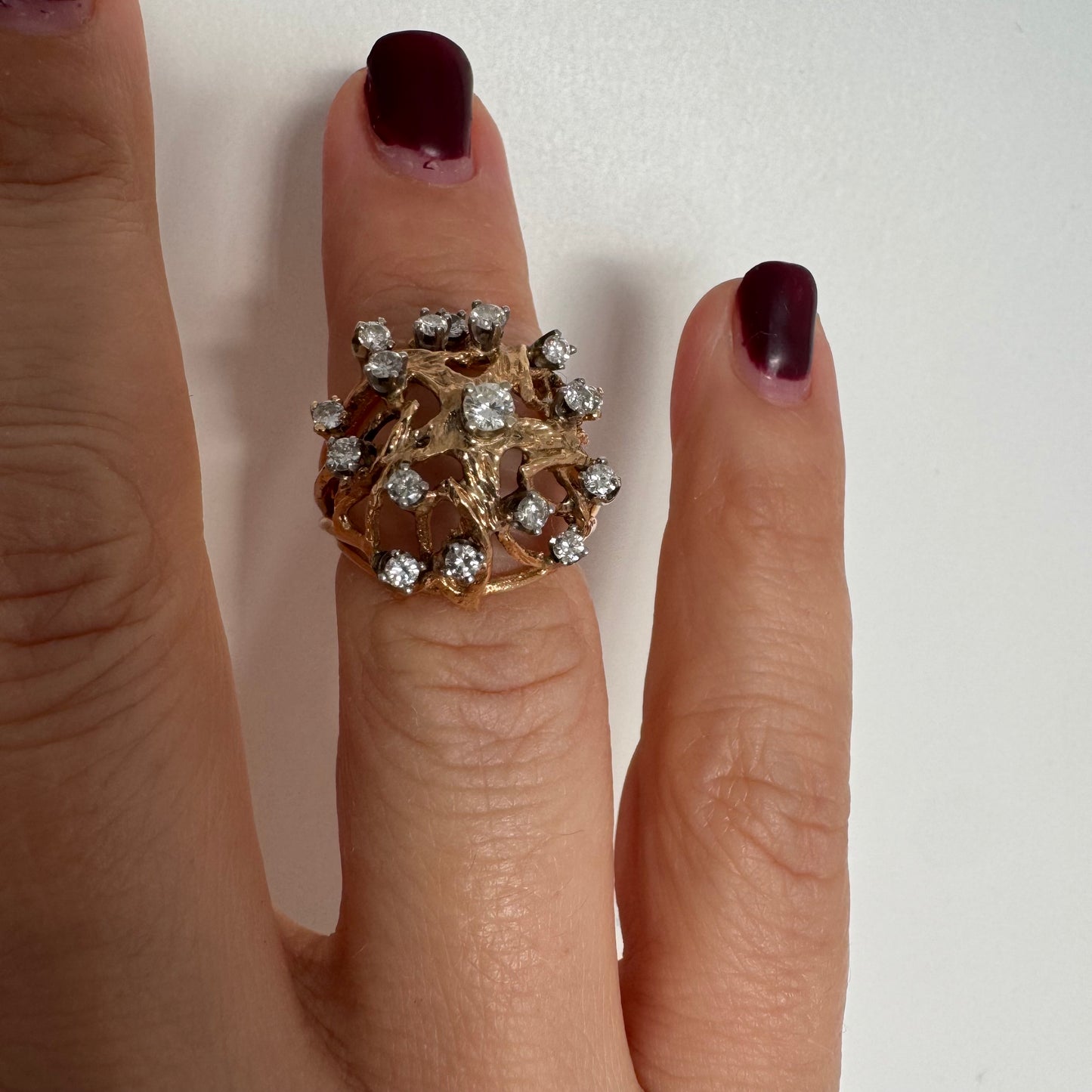 10K gold sculptural openwork ring set with Diamonds