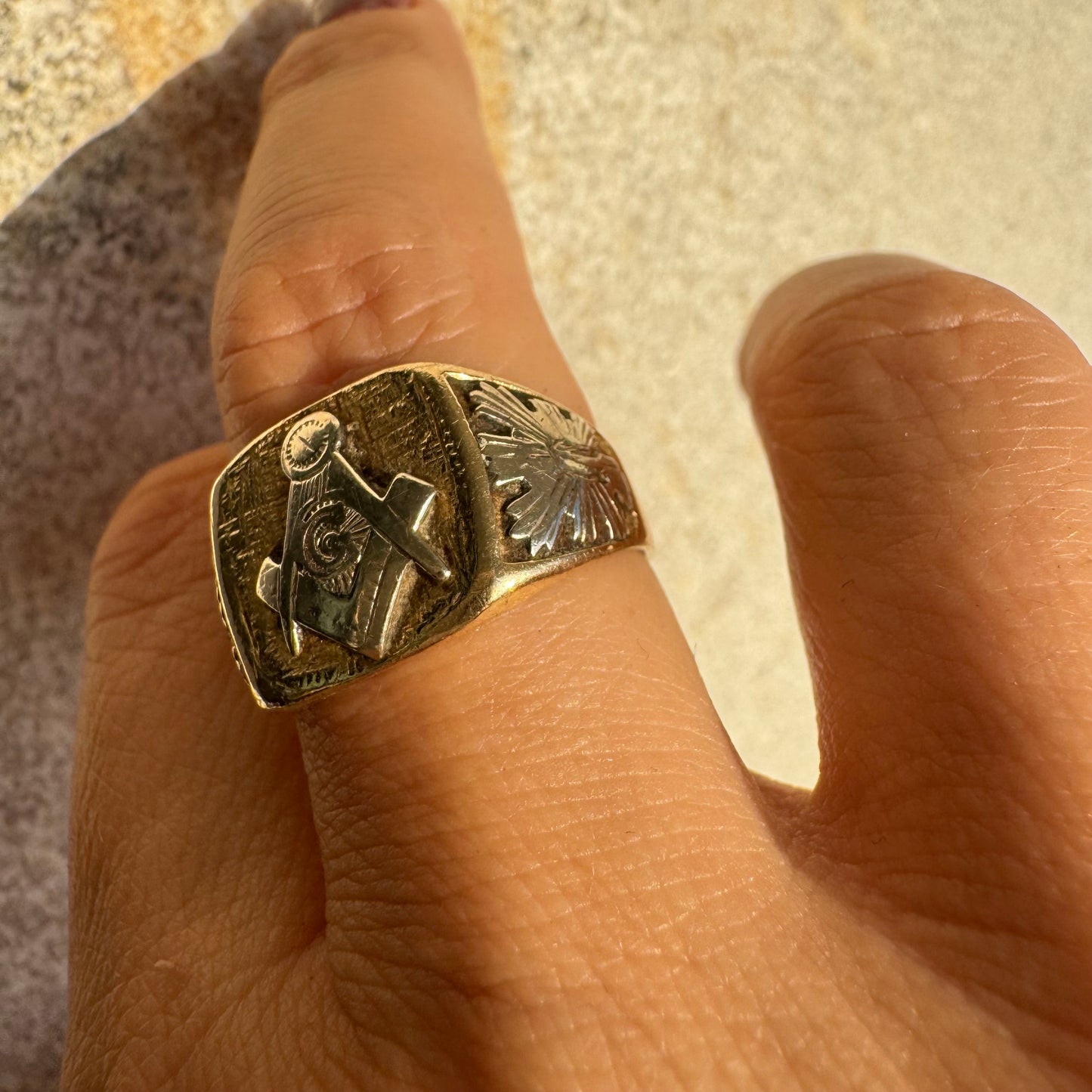 14K gold vintage Masonic ring featuring the iconic square and compass emblem.