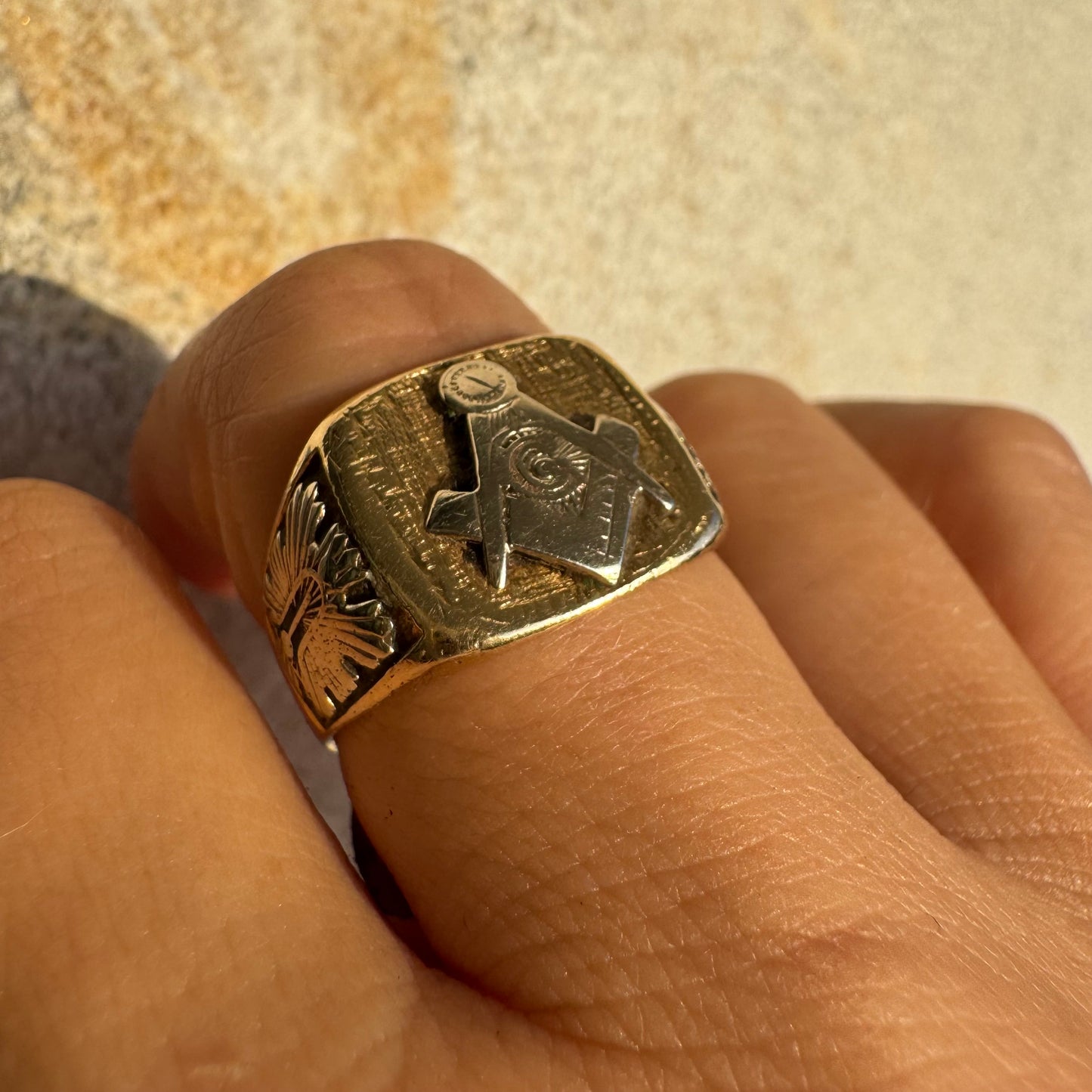 14K gold vintage Masonic ring featuring the iconic square and compass emblem.