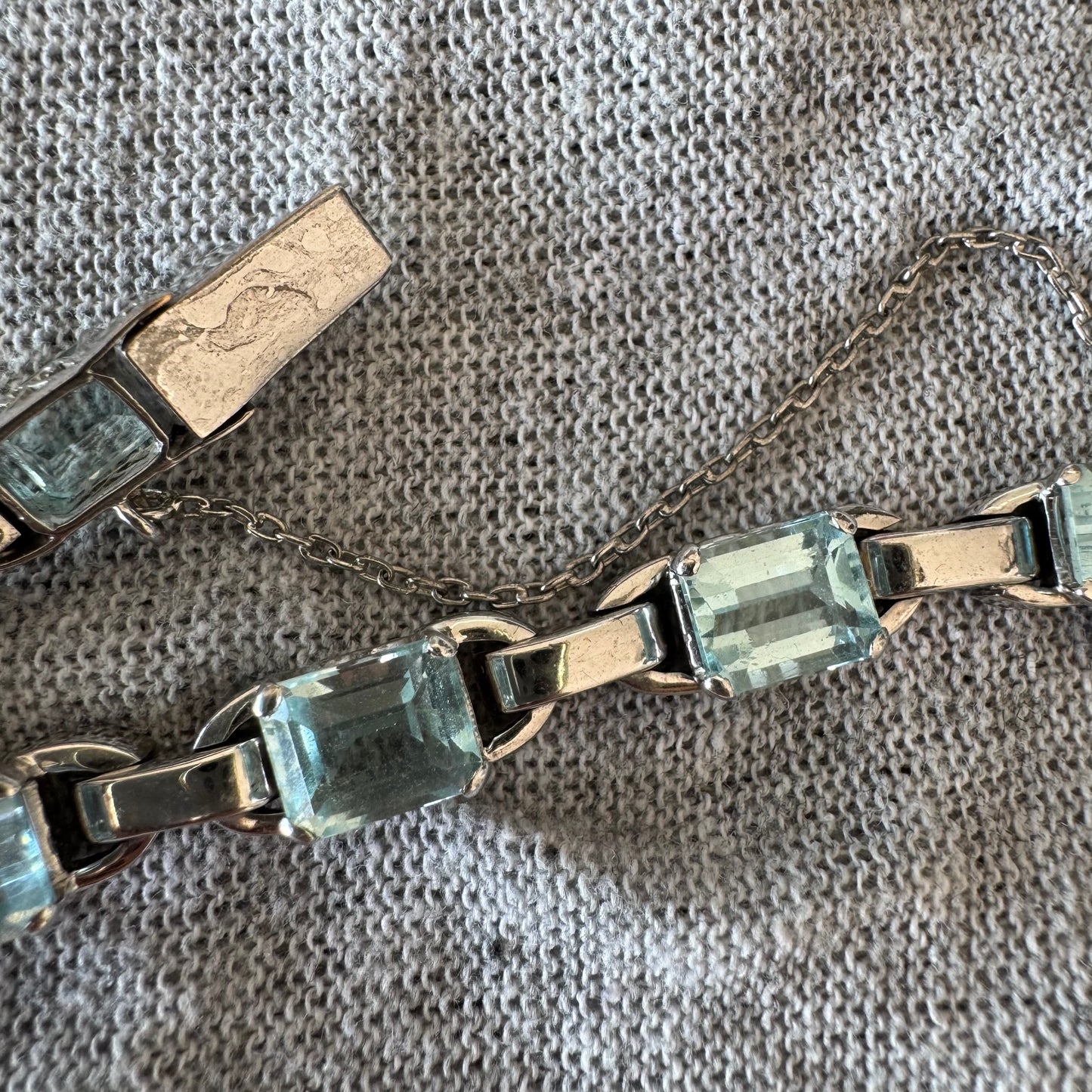 18K white gold bracelet set with large emerald-cut Aquamarine stones — elegant, radiant, and timeless.