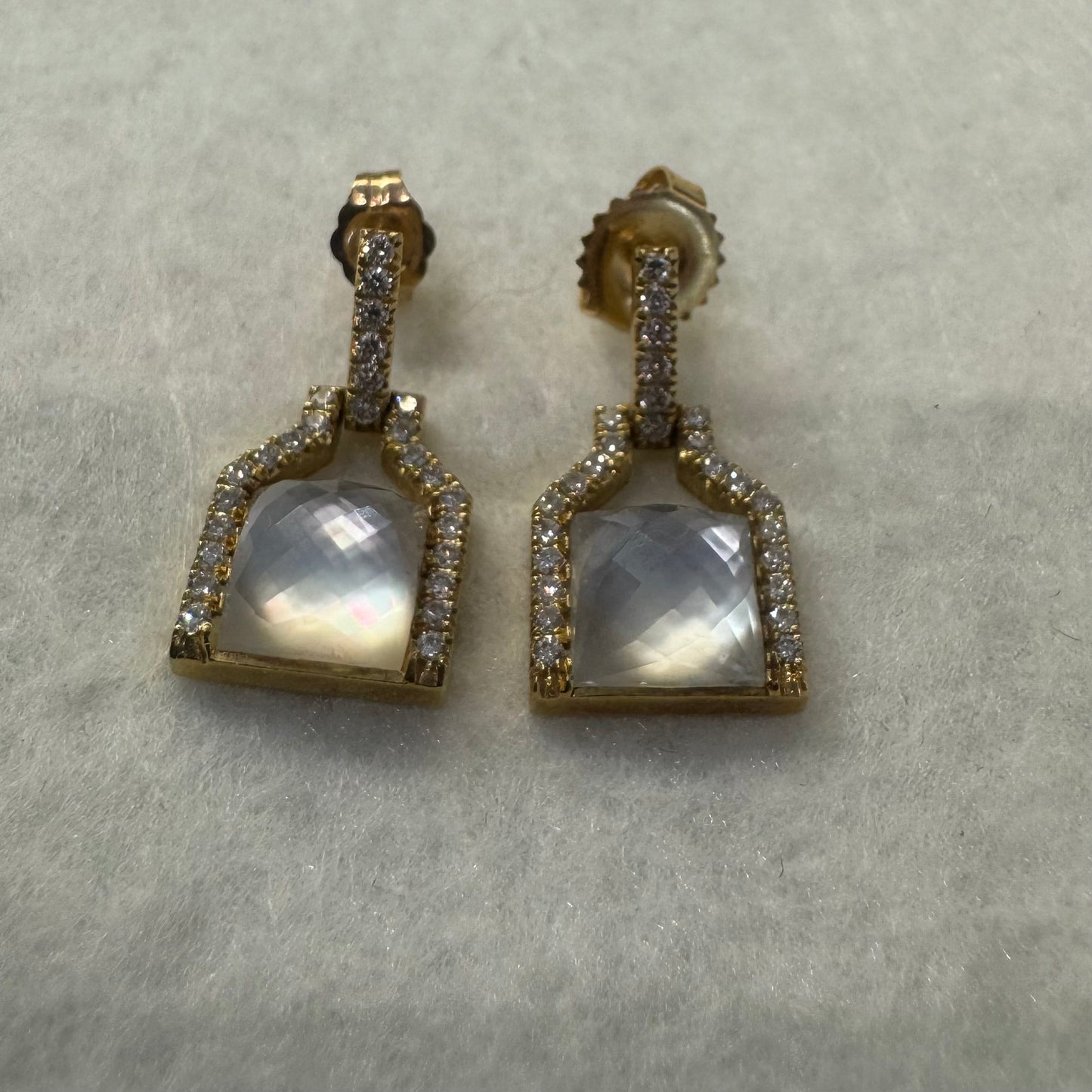 18K gold earrings featuring a cushion-cut translucent Gemstone, framed with sparkling Diamonds