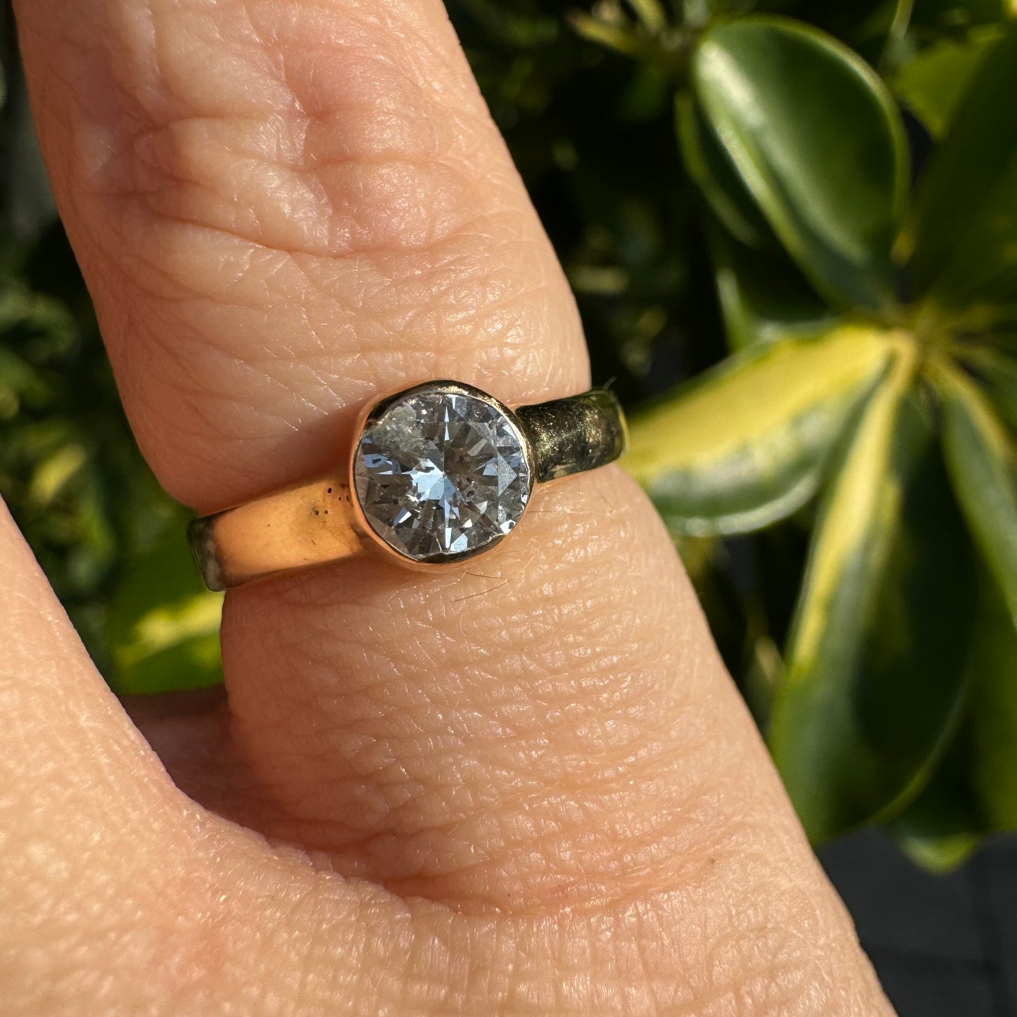 14K gold ring set with one center Diamond